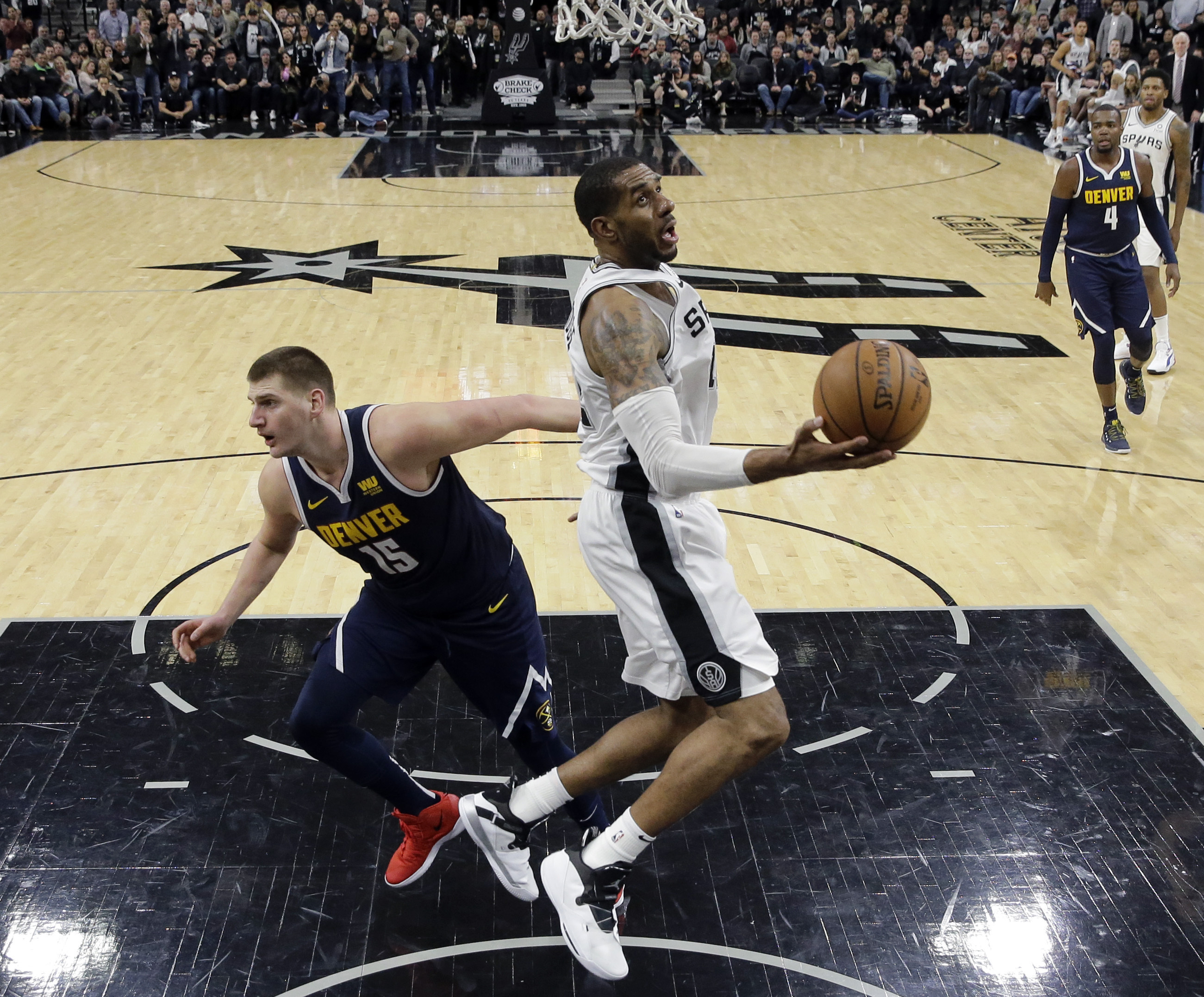 Spurs hold off Nuggets’ late rally in 104-103 win