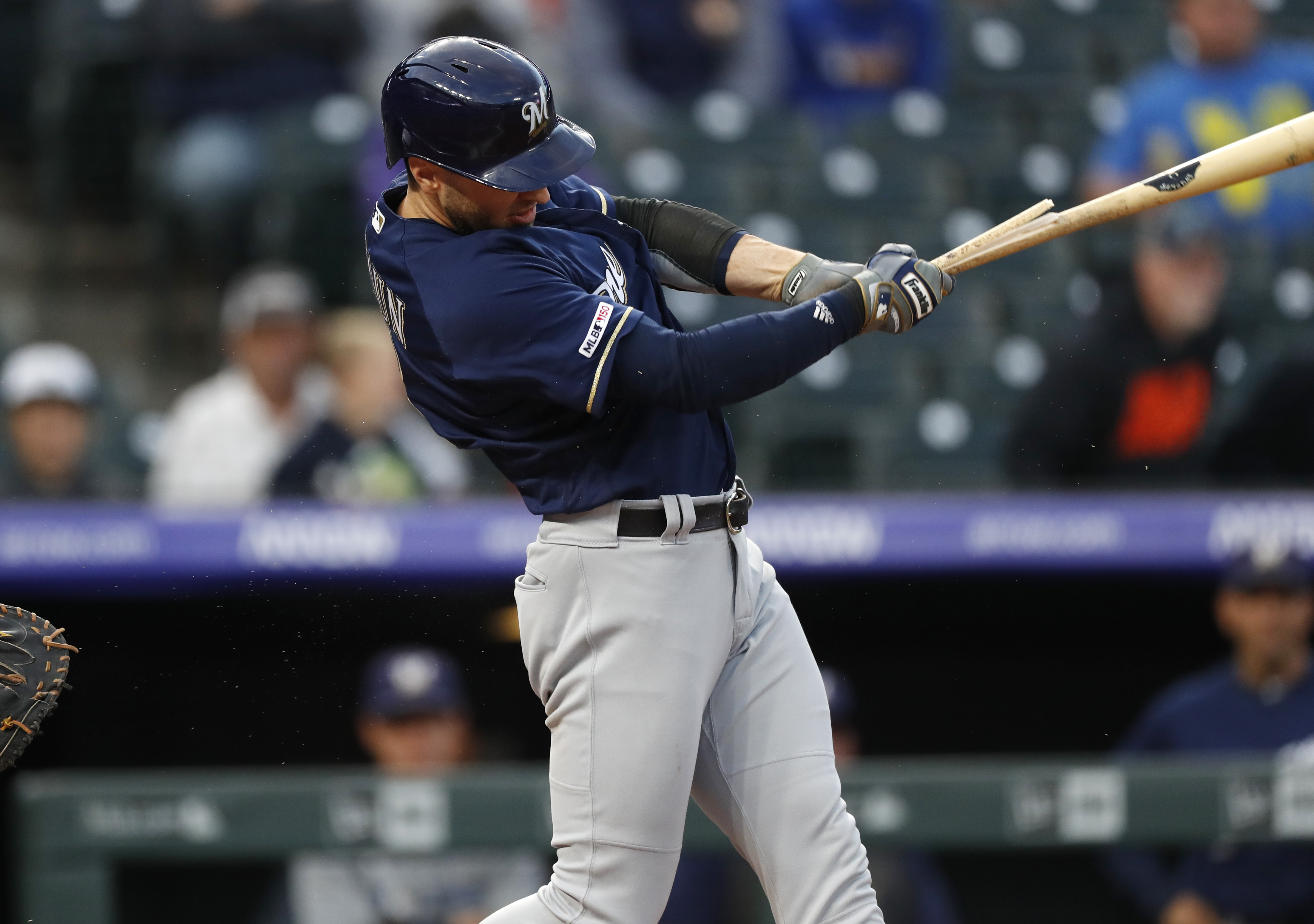 Brewers slip in NL Central chase, fall to Rockies 11-7