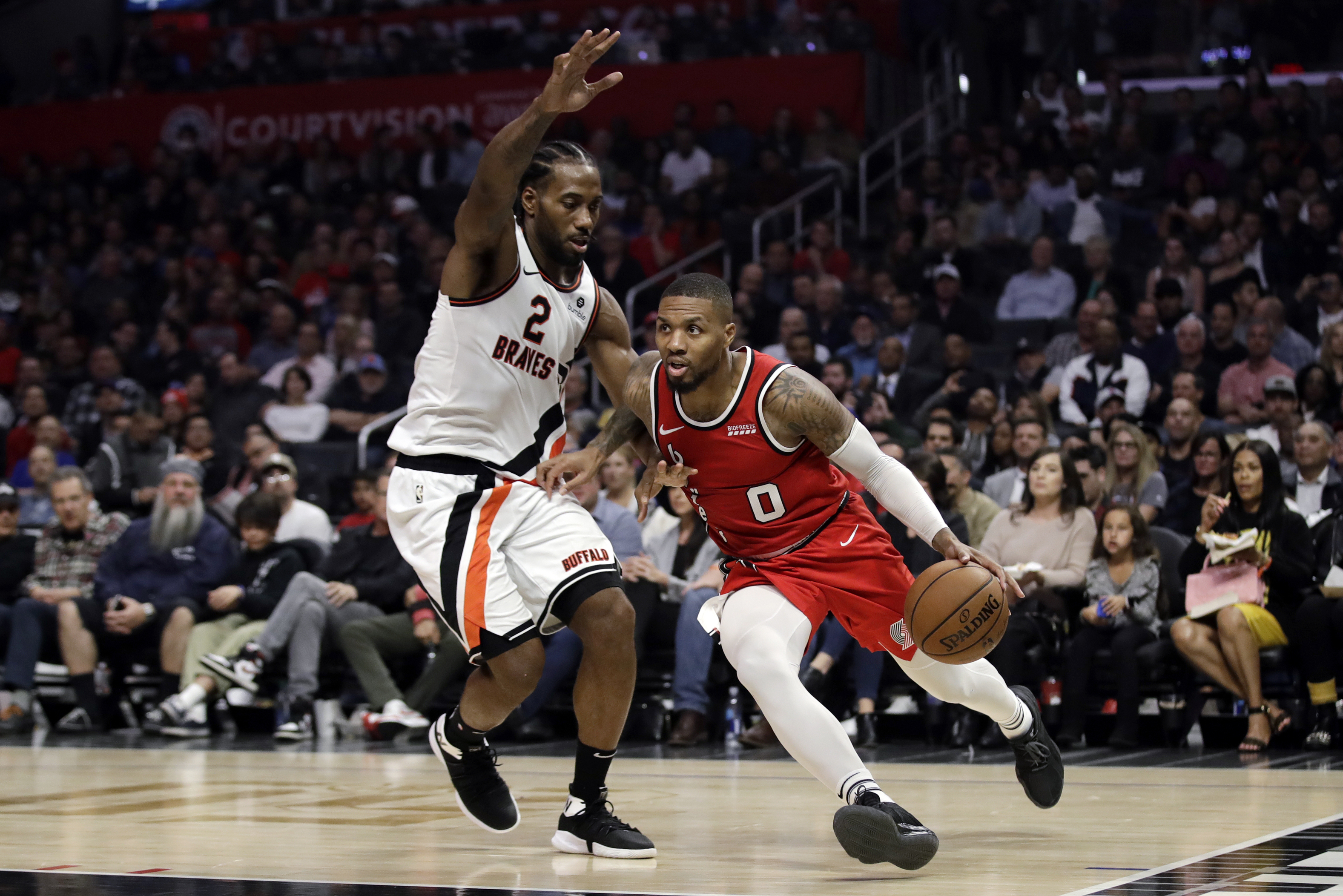 Clippers beat Trail Blazers 107-101 for Rivers' 900th win