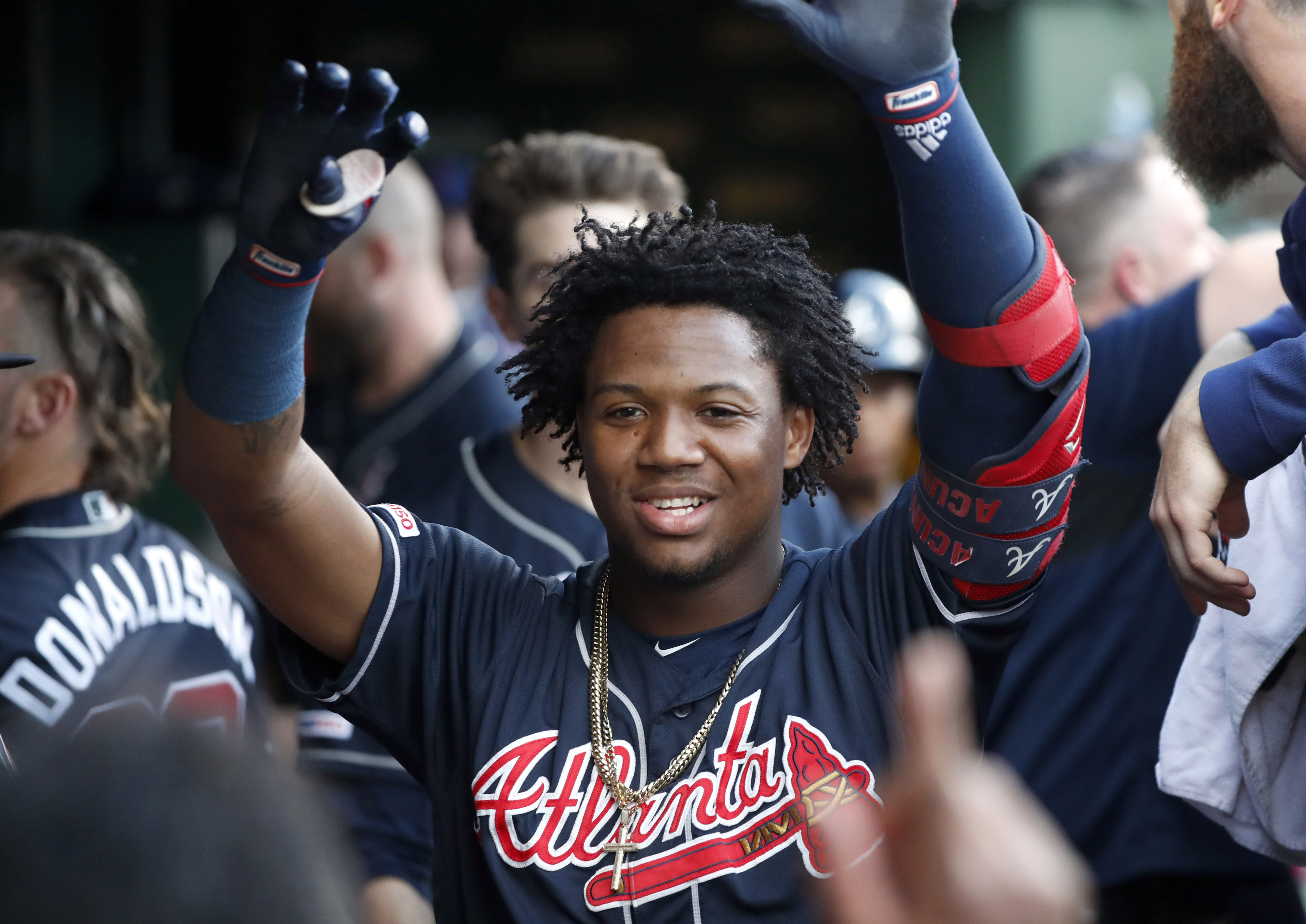 Albies, Acuña hit homers to lead Braves past Cubs 3-2