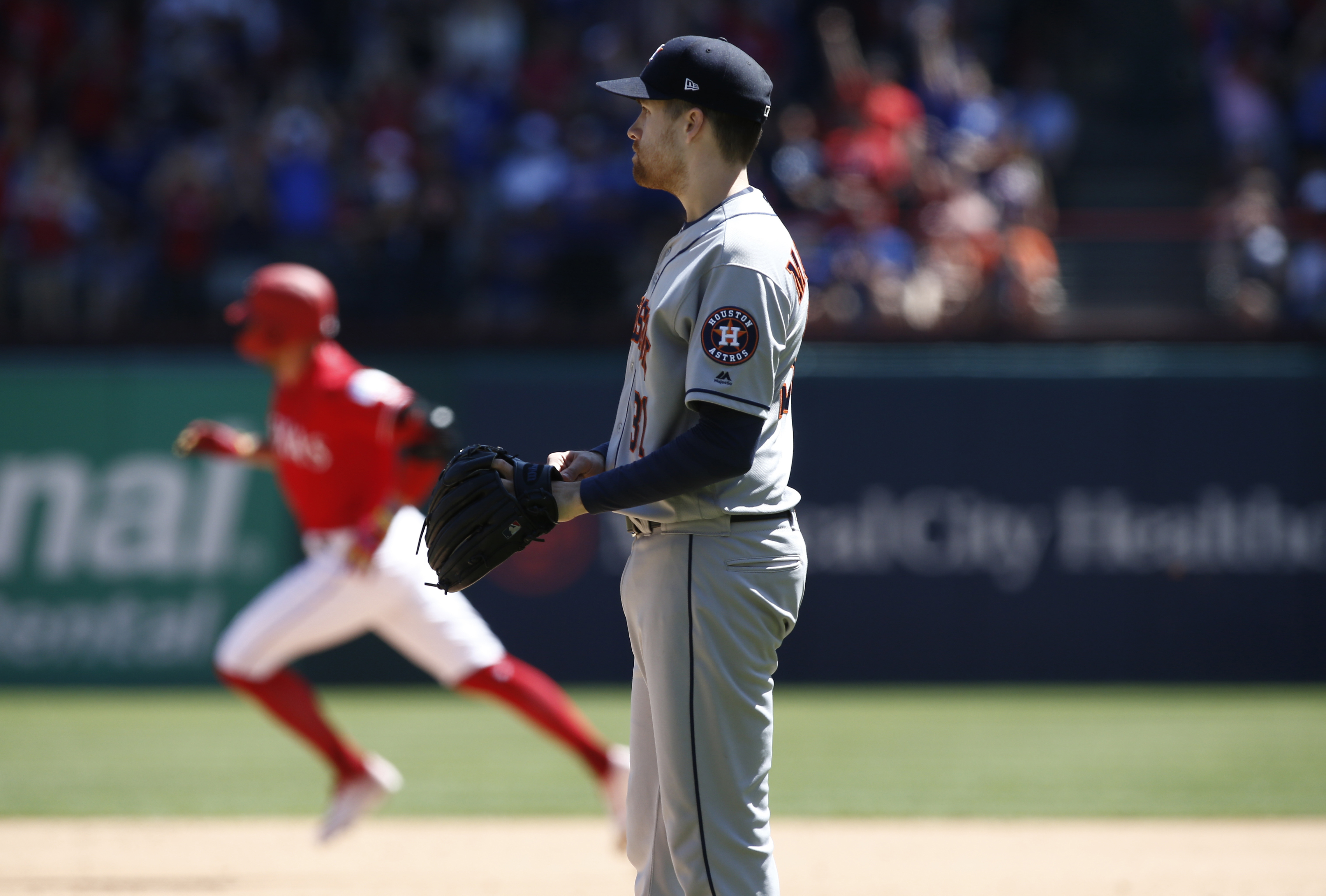 Gallo gets 1st sac fly, Rangers hold on to beat Astros 11-10