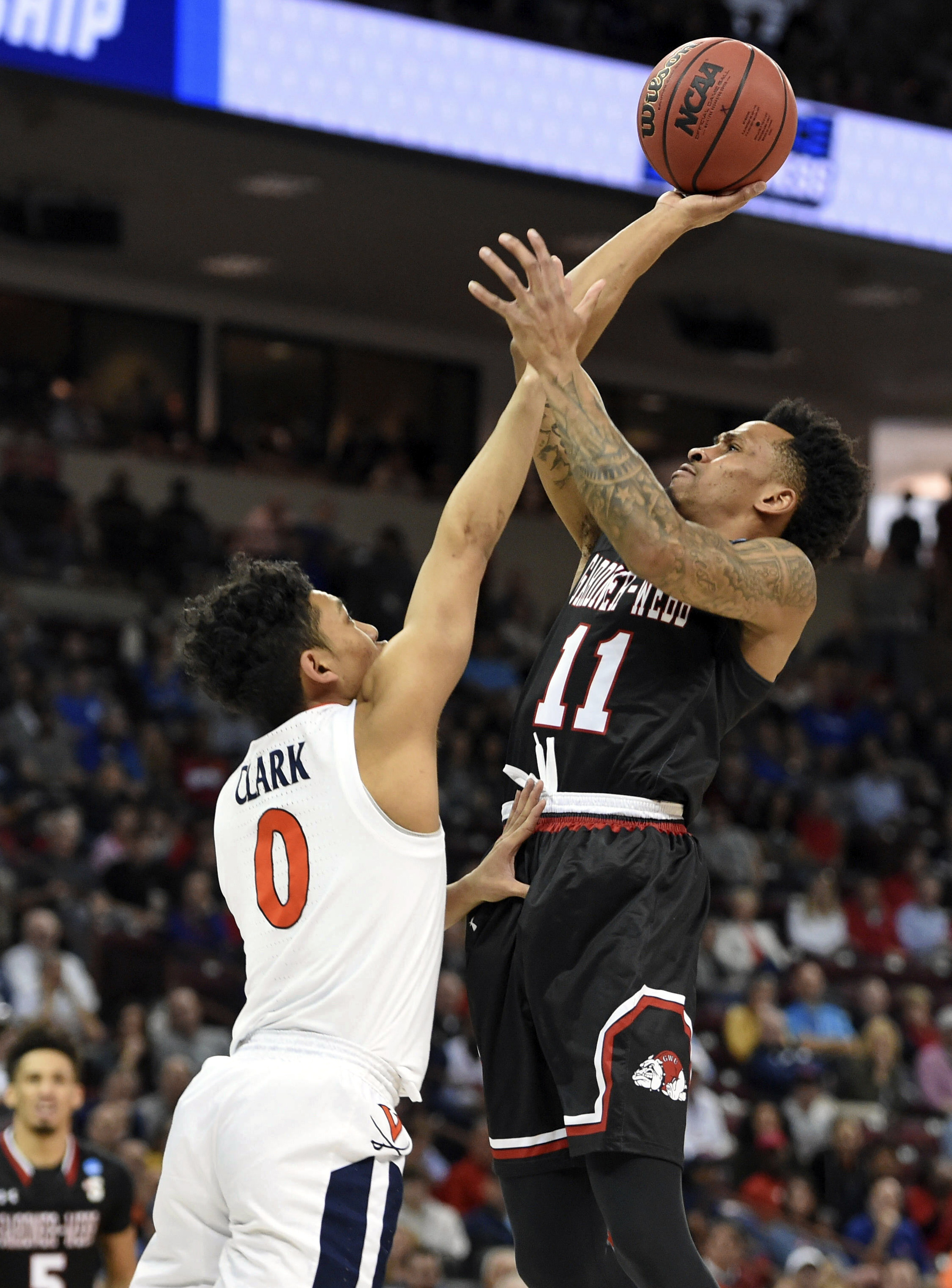 No. 1 Virginia avoids 2nd straight huge NCAA tourney upset