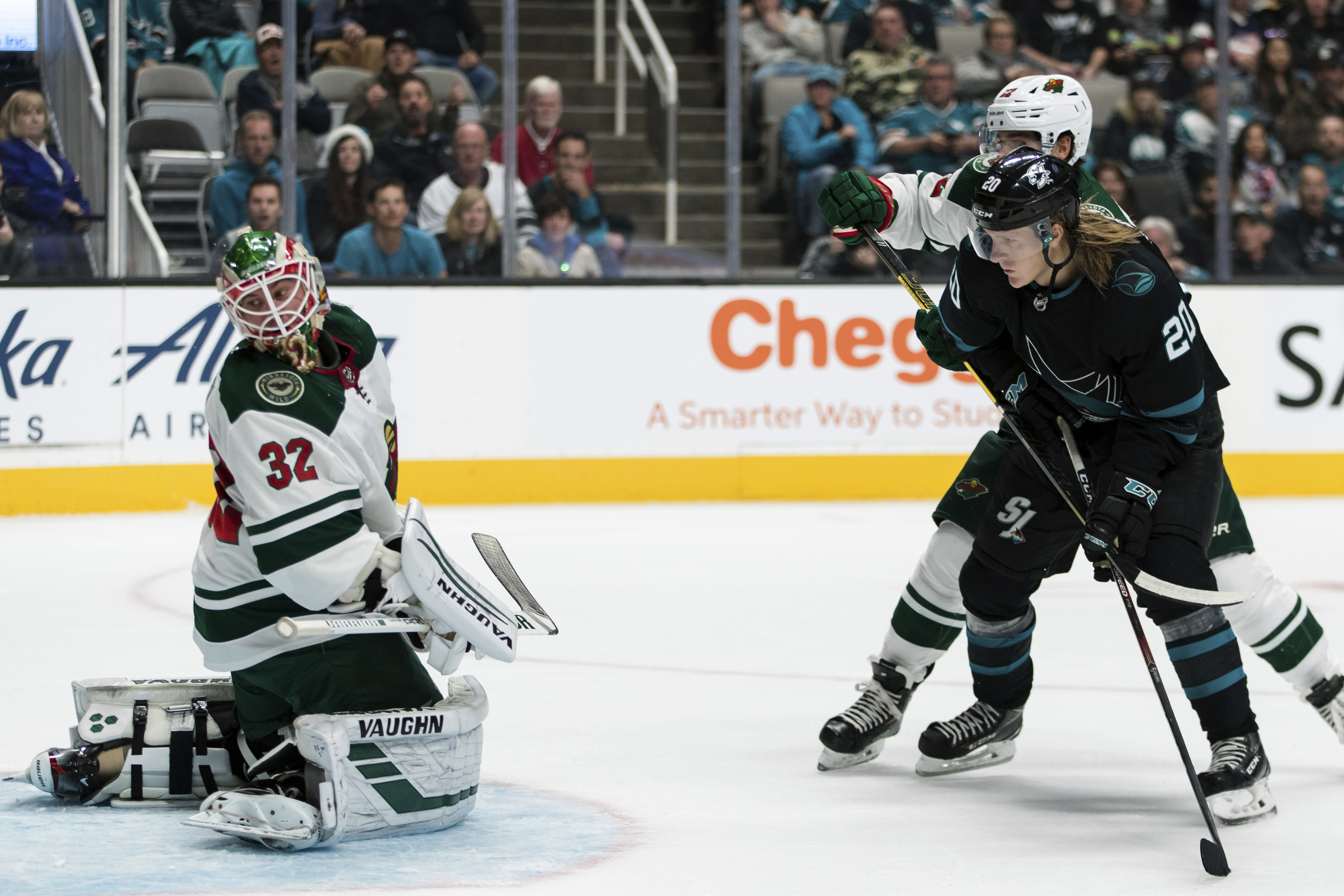 Sharks withstand late surge by Wild in 6-5 victory