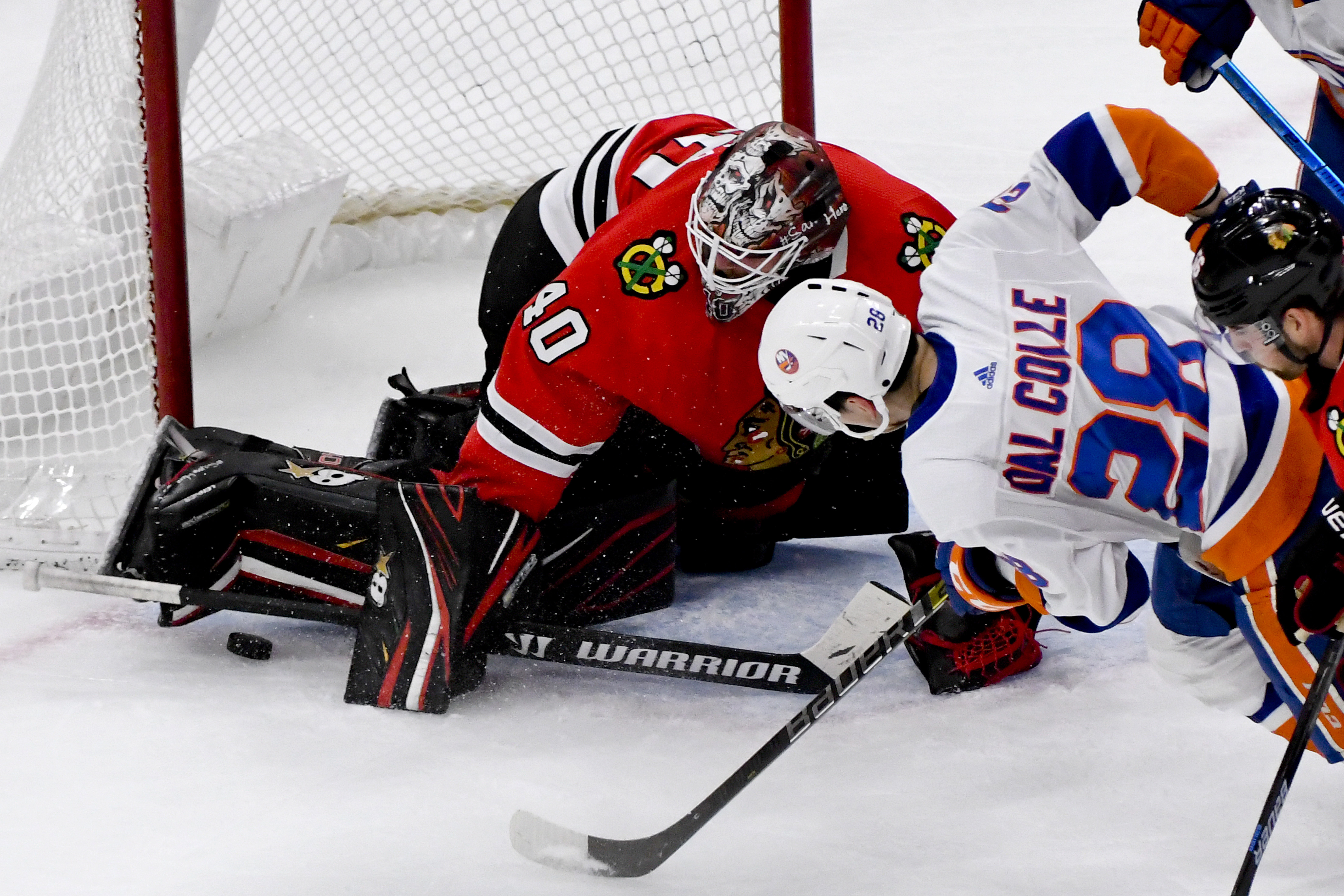 Lehner makes 38 saves as Blackhawks beat Islanders 5-2