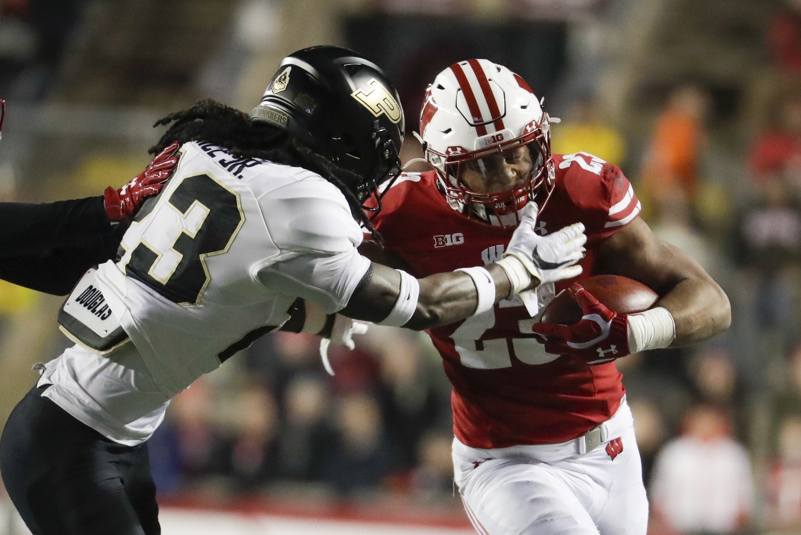 Taylor runs for 222 in No. 14 Badgers’ 45-24 win over Purdue
