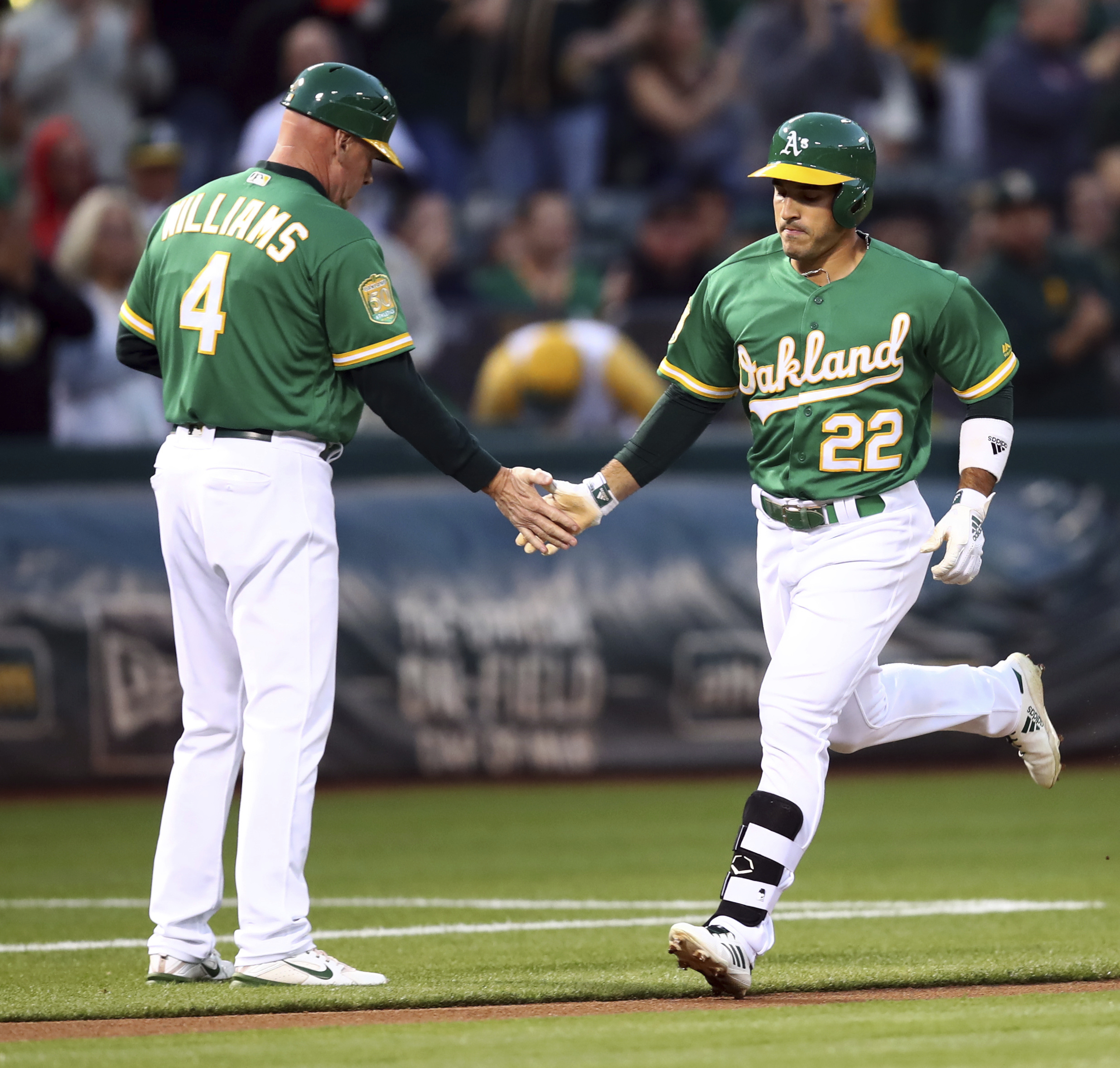 Laureano homers twice, Semien goes deep as A’s top Texas 8-4