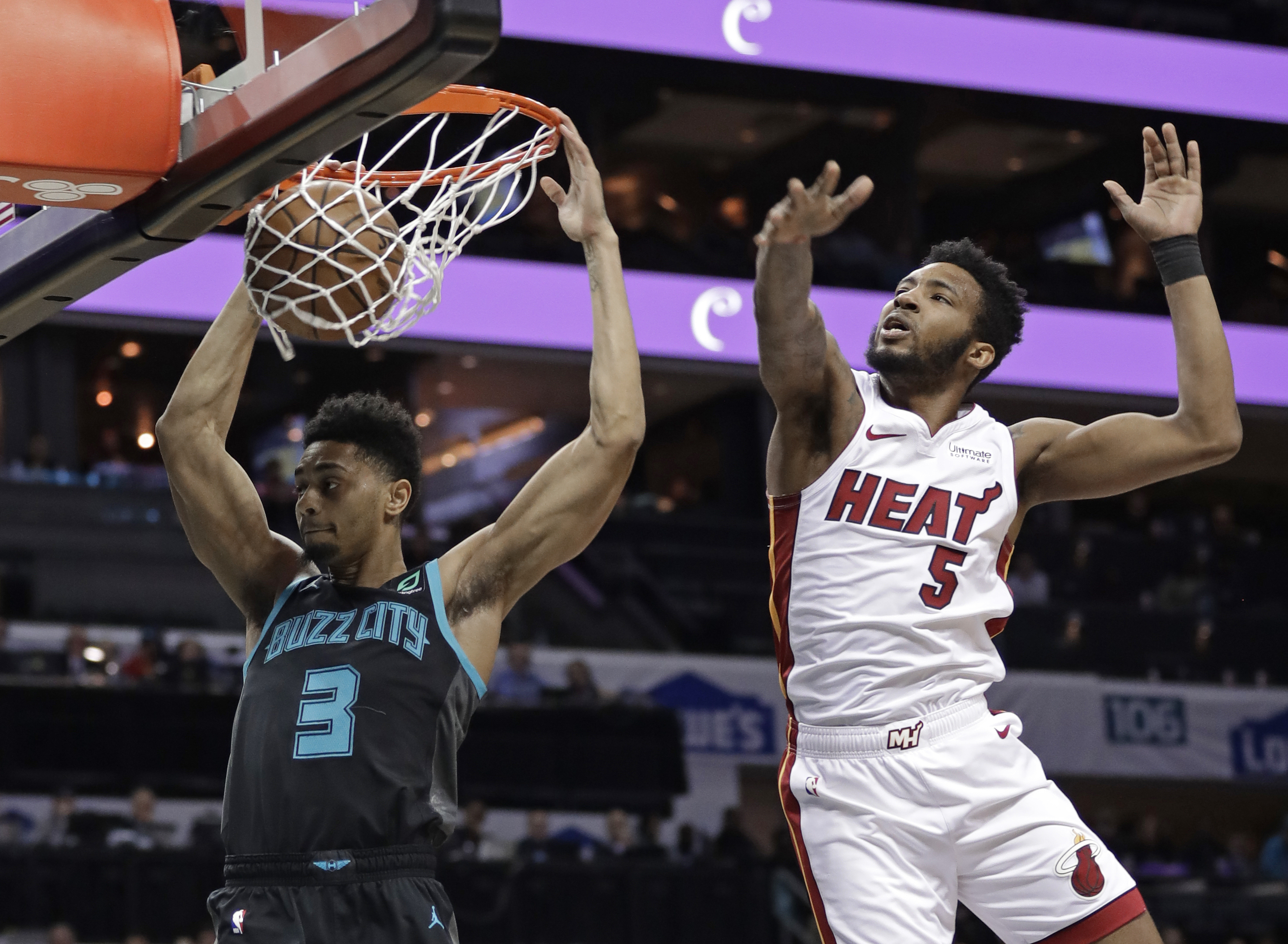 Olynyk, Whiteside lead Heat to a 91-84 win over Hornets
