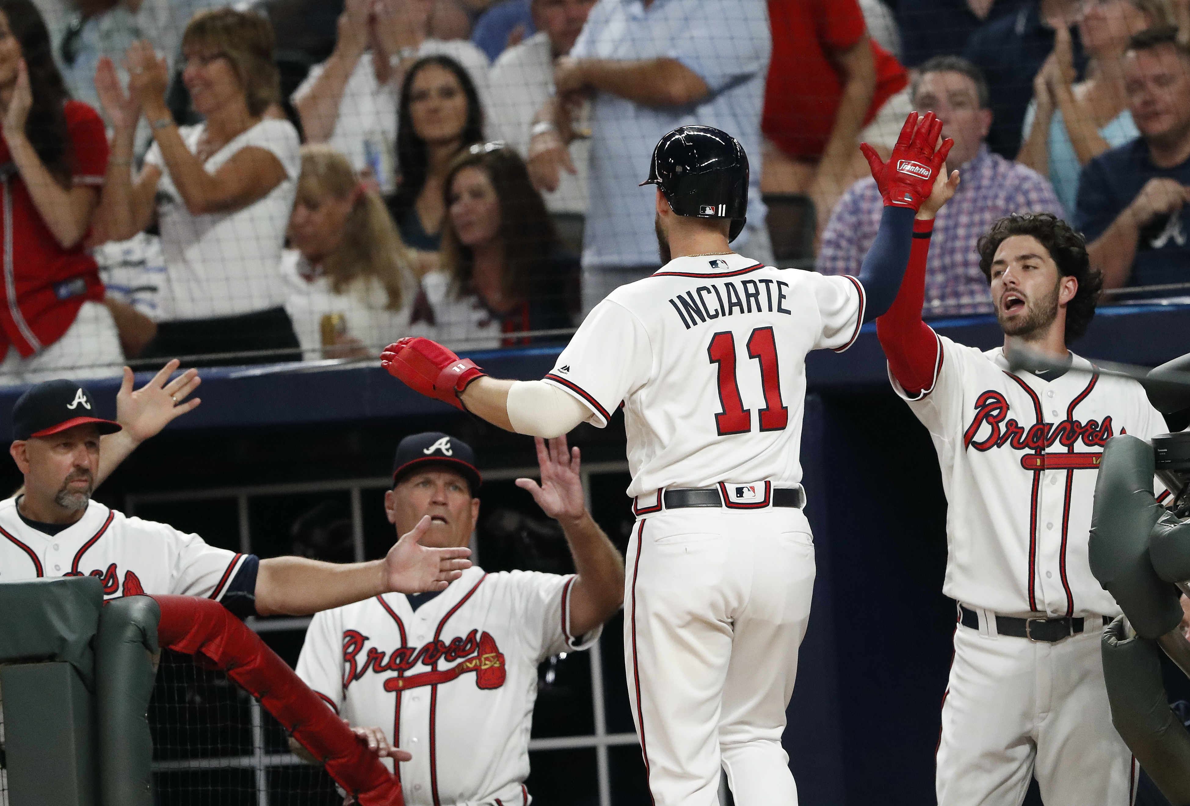 Braves top Phillies 8-3, move closer to clinching division