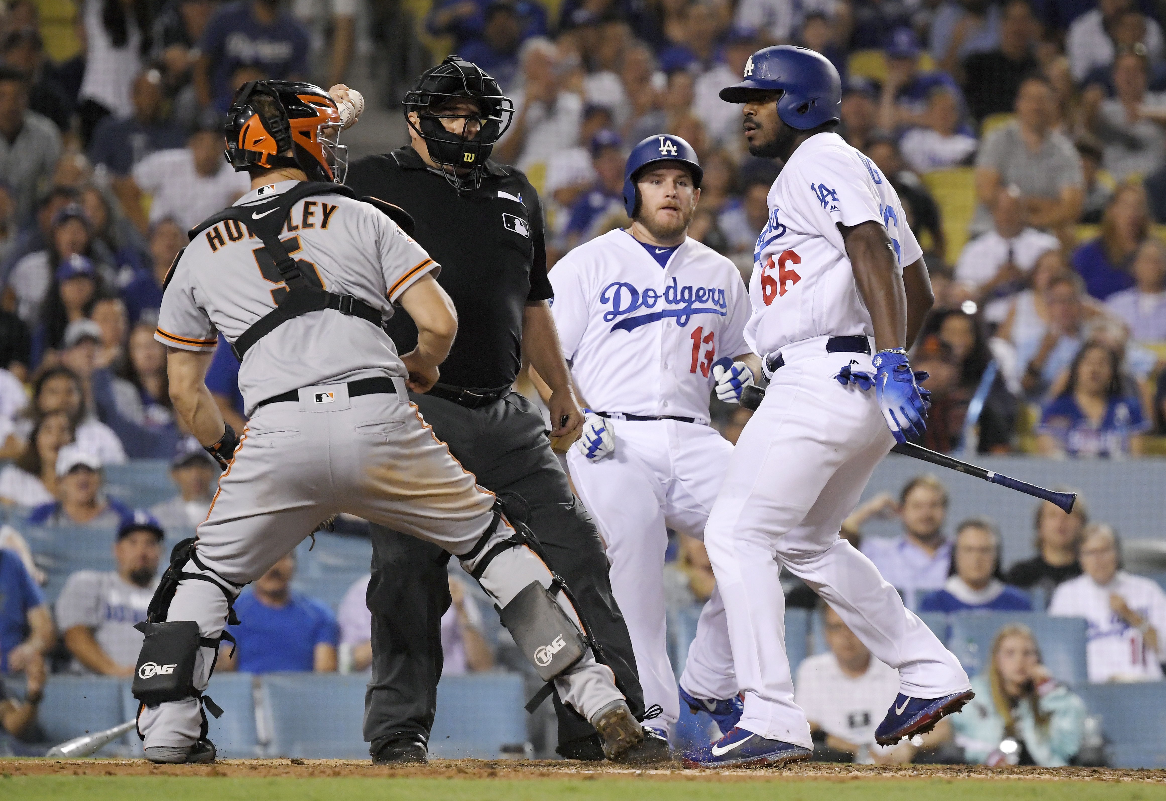 Puig takes swing at Hundley, both ejected as benches clear