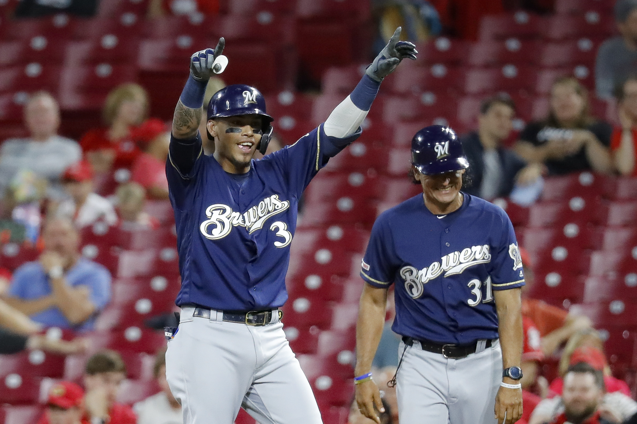 LEADING OFF: Brewers, Twins on brink of some bubbly