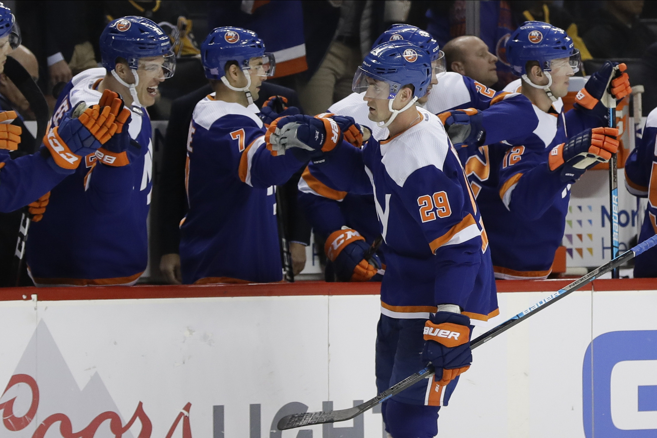 Islanders beat Pens 4-3 to extend point streak to 16 games.