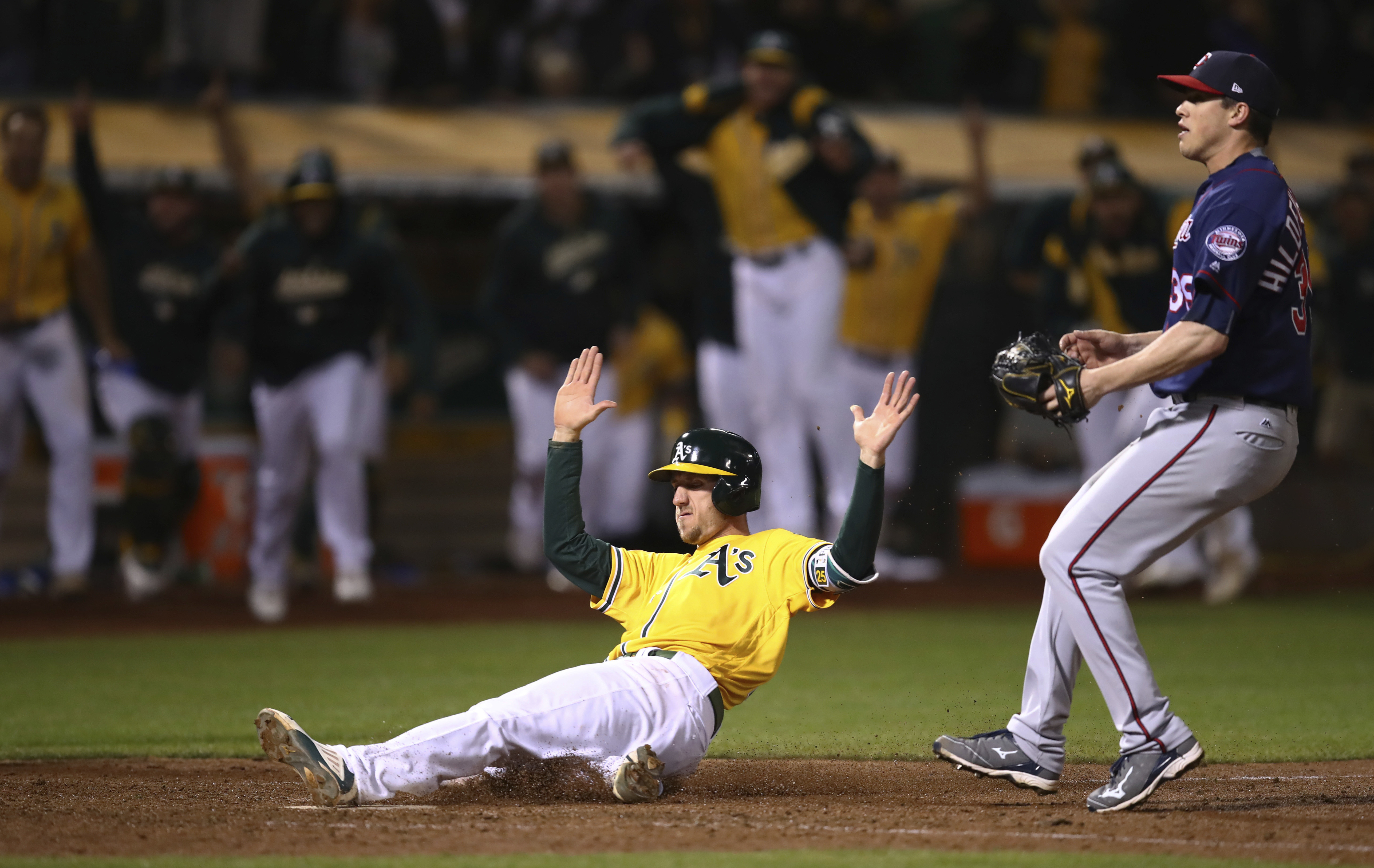 A’s cut magic number to 1 with another walk-off win