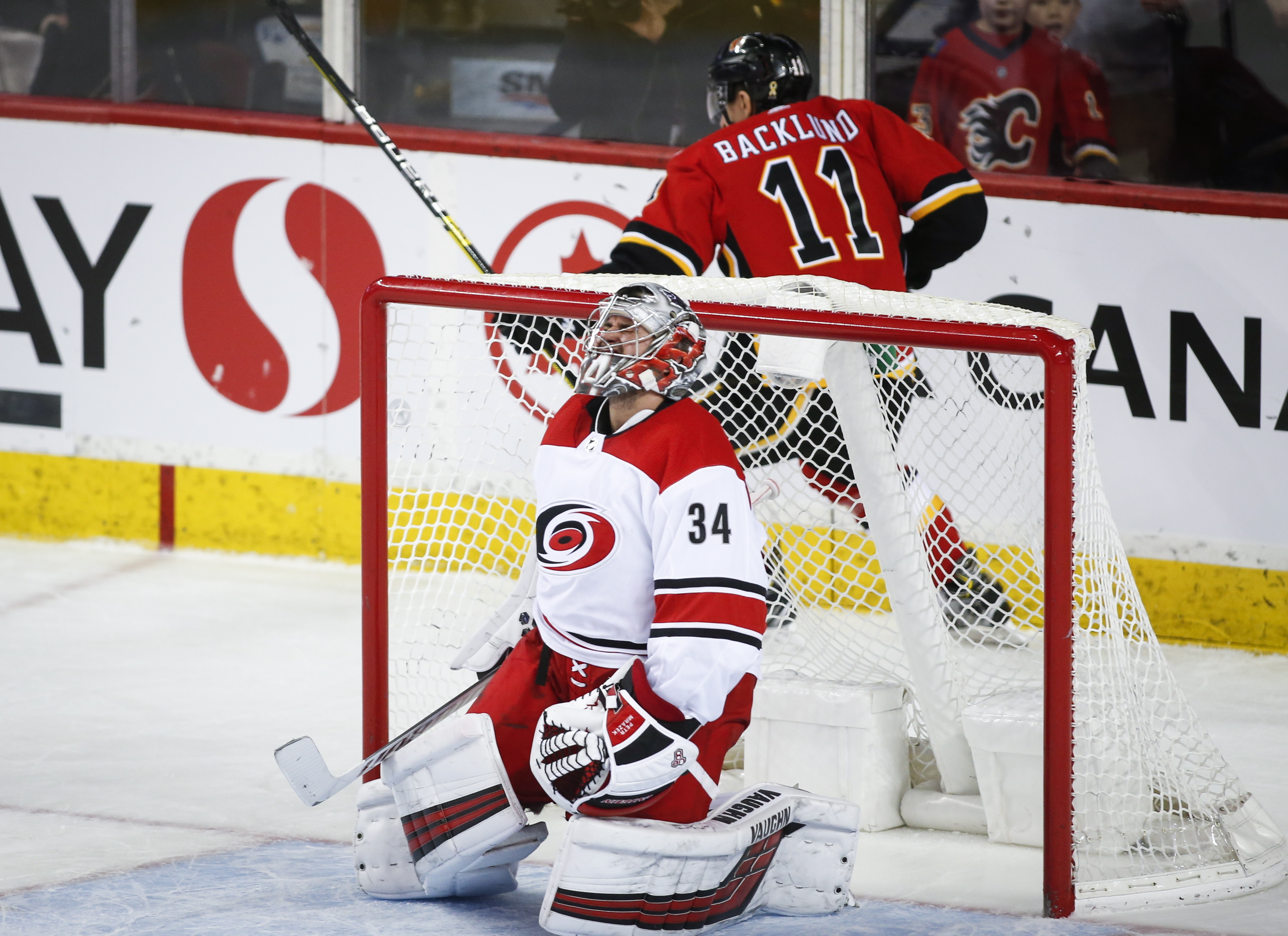 Backlund scores in OT to give Flames 3-2 win over Hurricanes