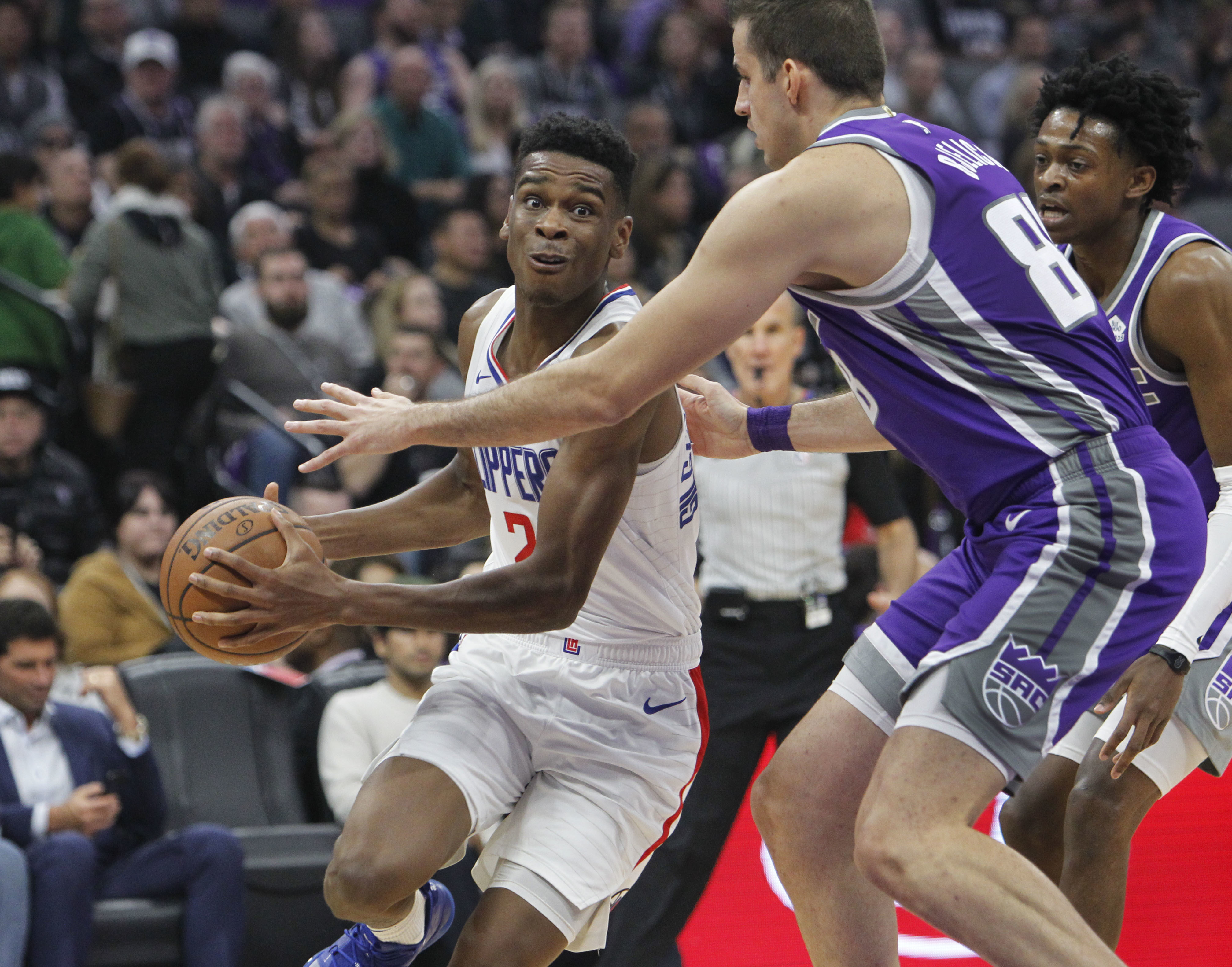 Harris, Harrell help Clippers hold off Kings 133-121