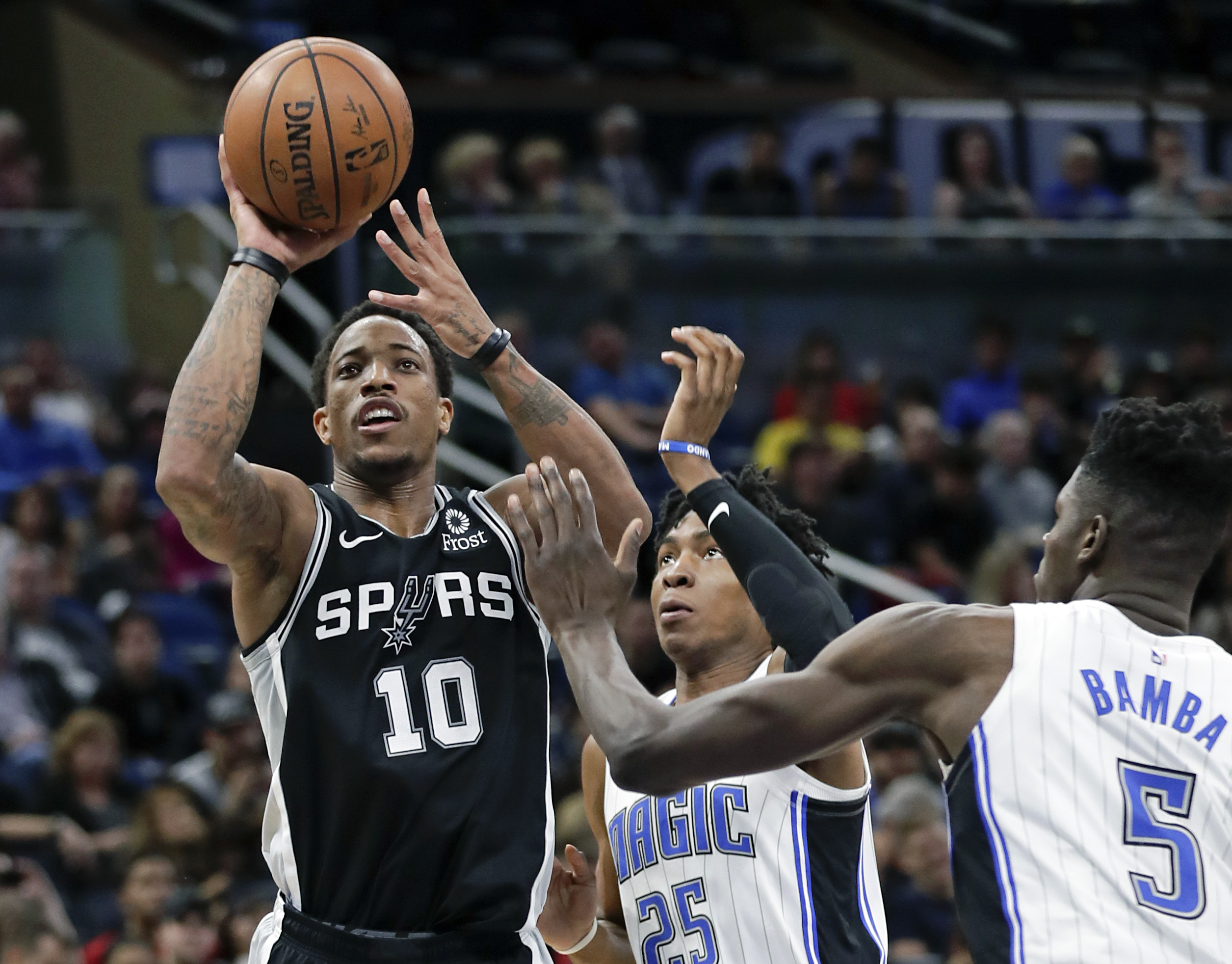 Aldridge nets 20, hot-shooting Spurs rout Magic 129-90