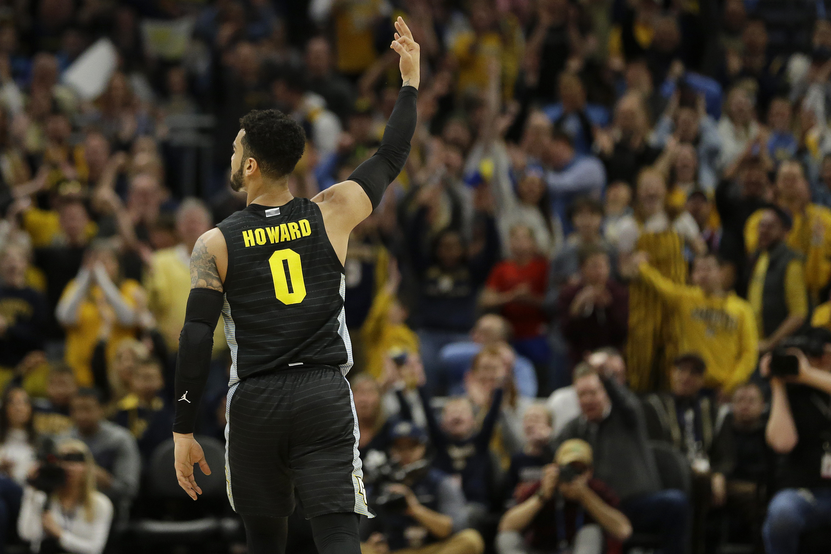 Howard leads Marquette to 71-60 win over No. 10 Villanova