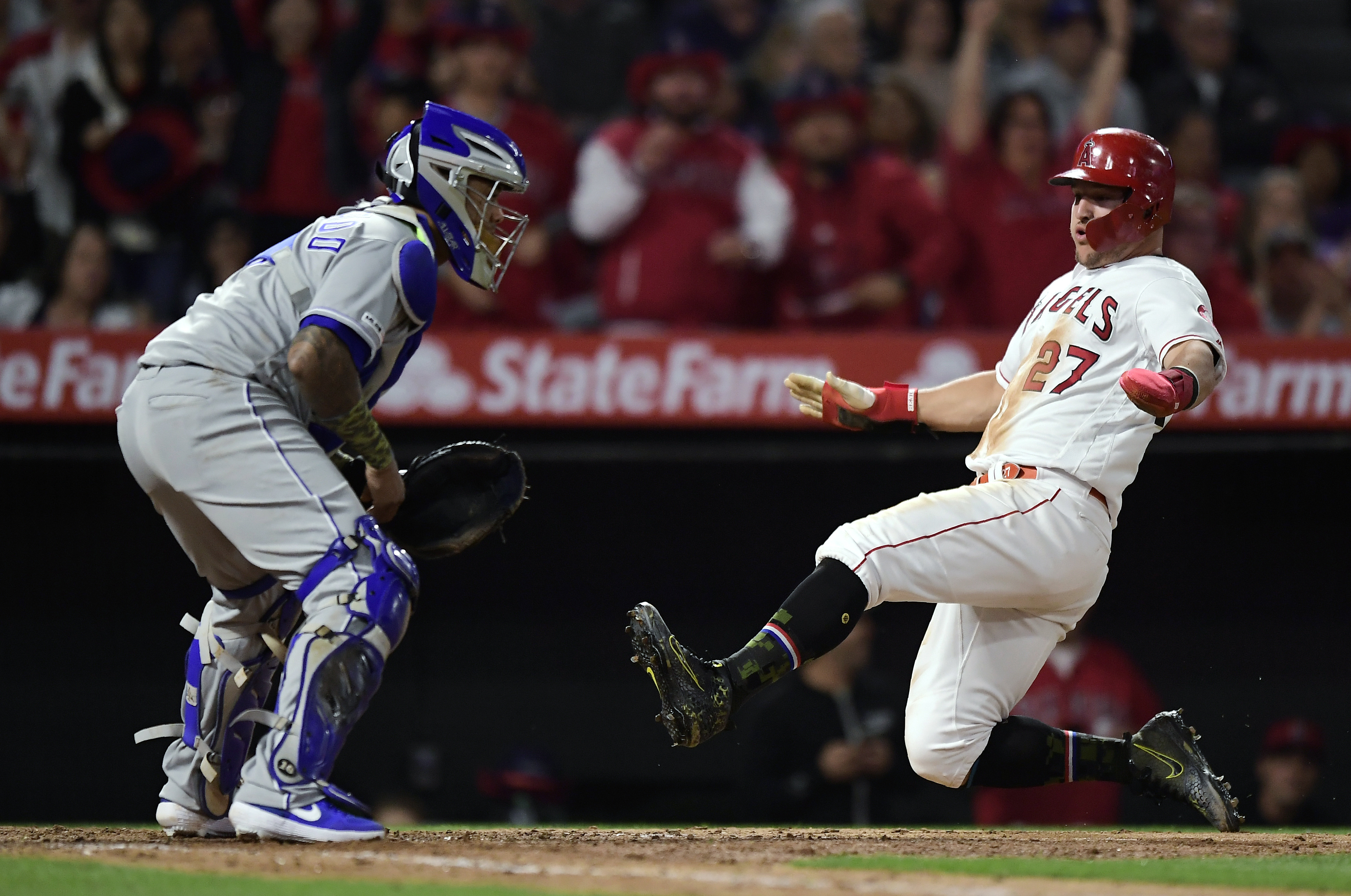 Trout, Pujols back Harvey and lift Angels over Royals 5-2