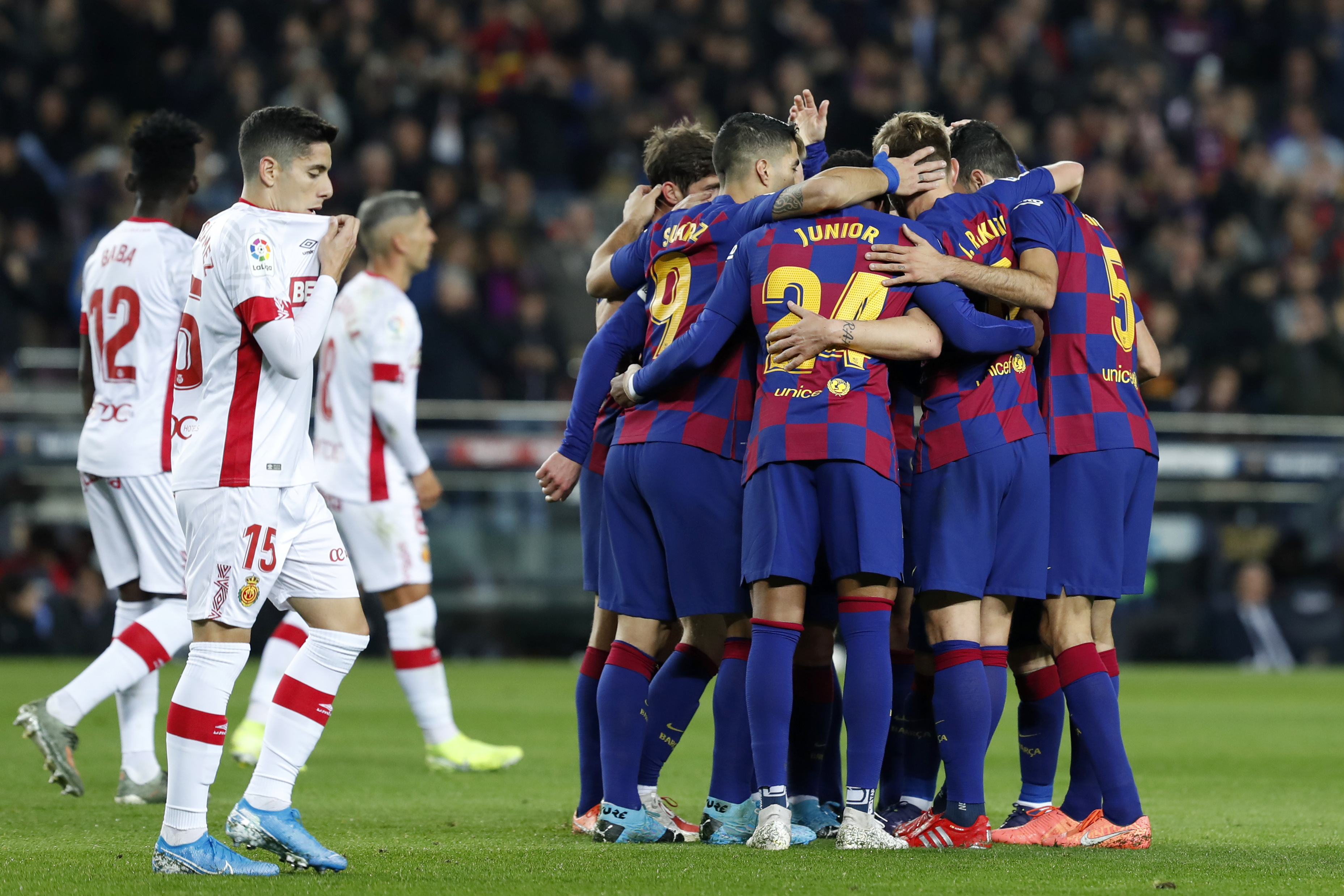 Barcelona wins with Messi hat trick, Suarez backheel goal
