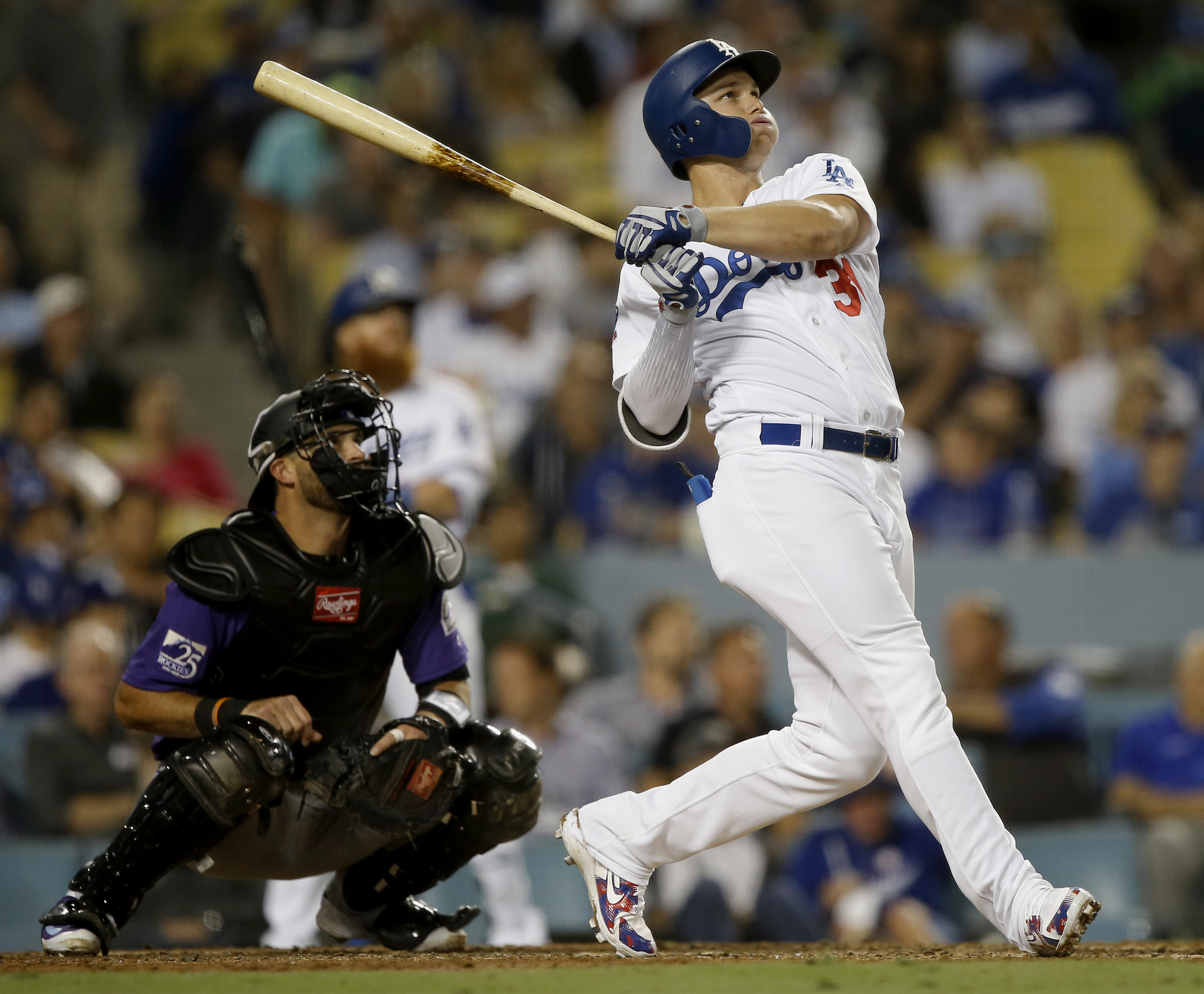 Dodgers top Rockies 8-2, move back into 1st in NL West