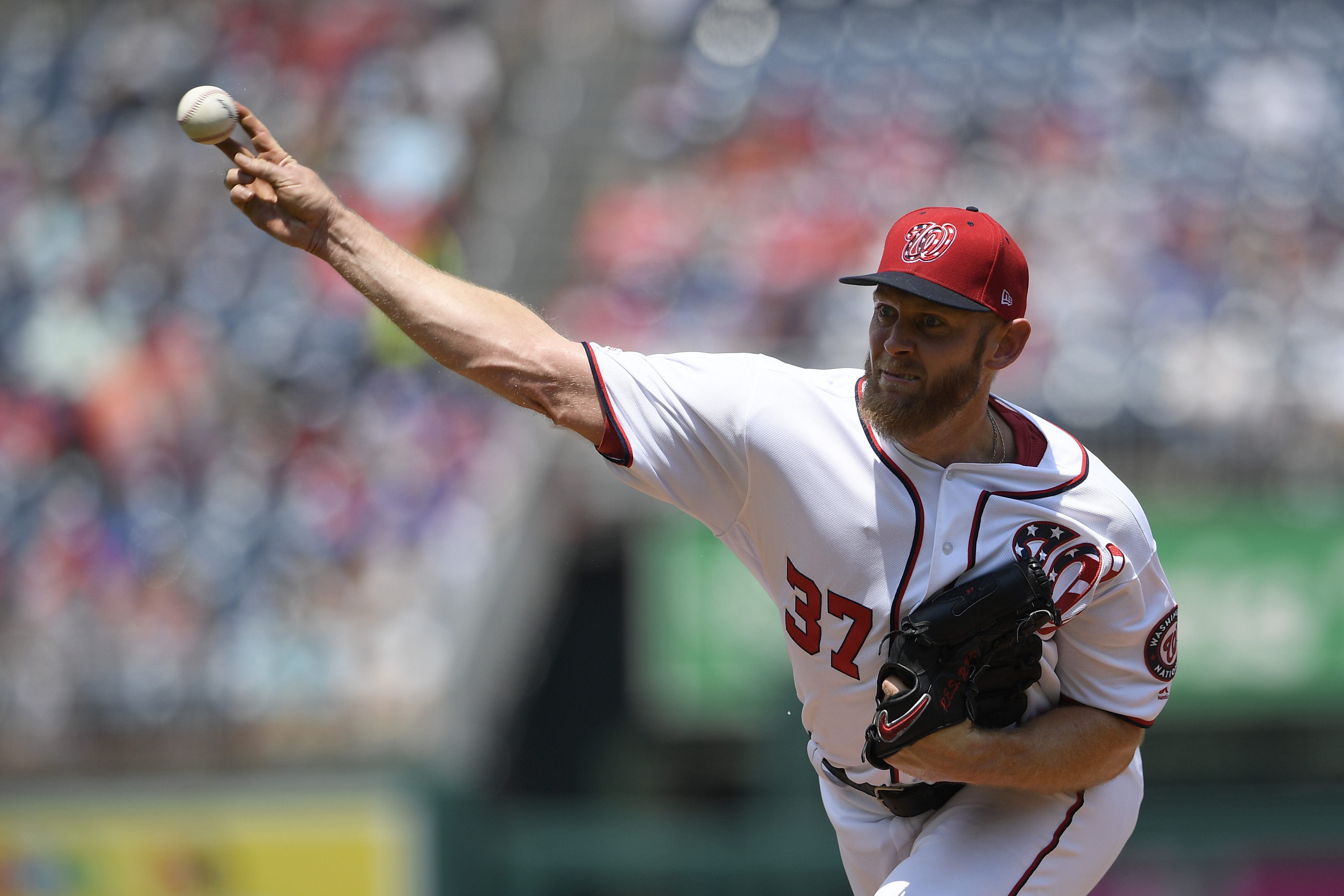 Strasburg fires gem for MLB-best 14th win, Nats rout Dodgers