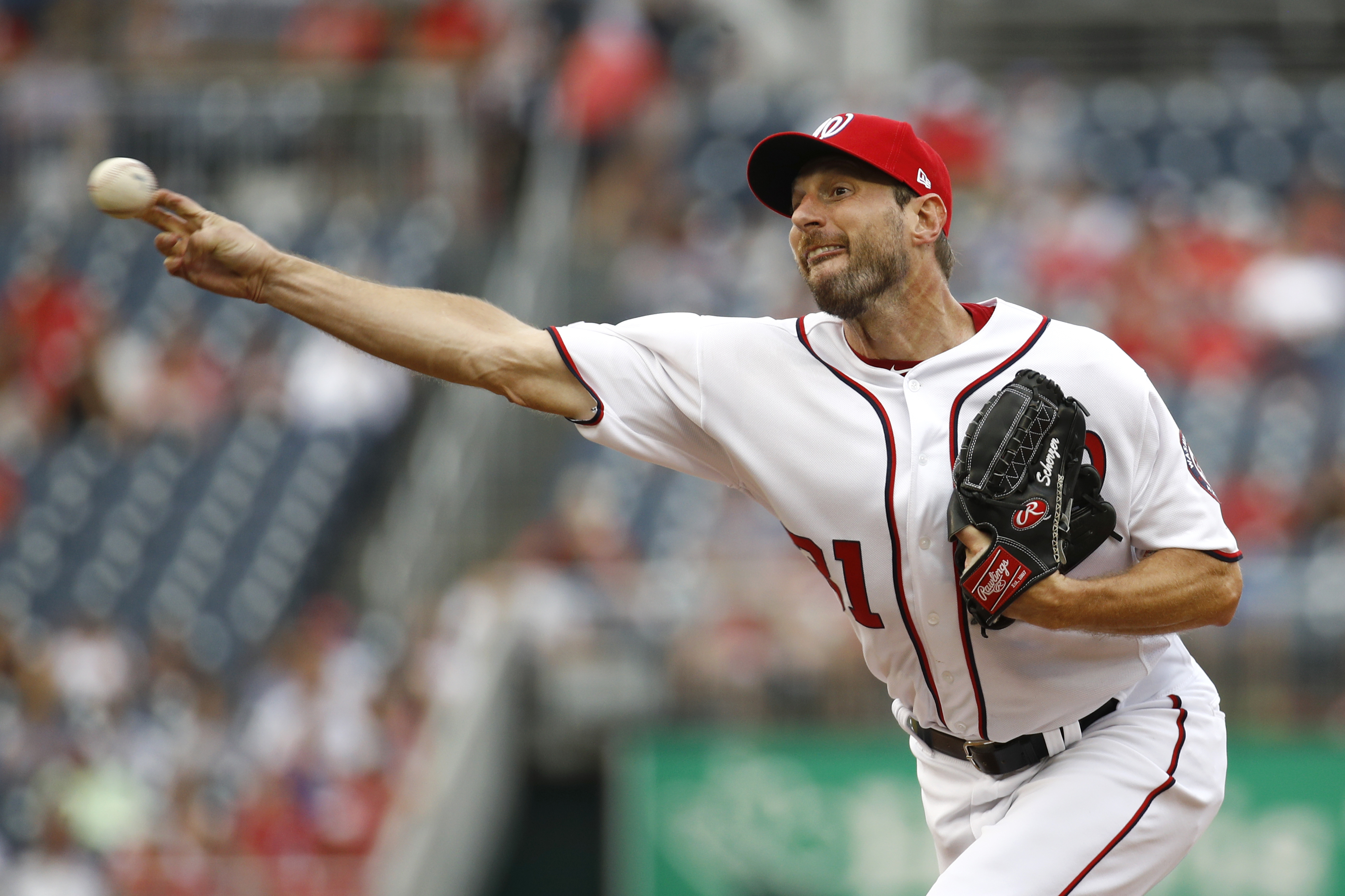 A day after returning from IL, Scherzer has strained back