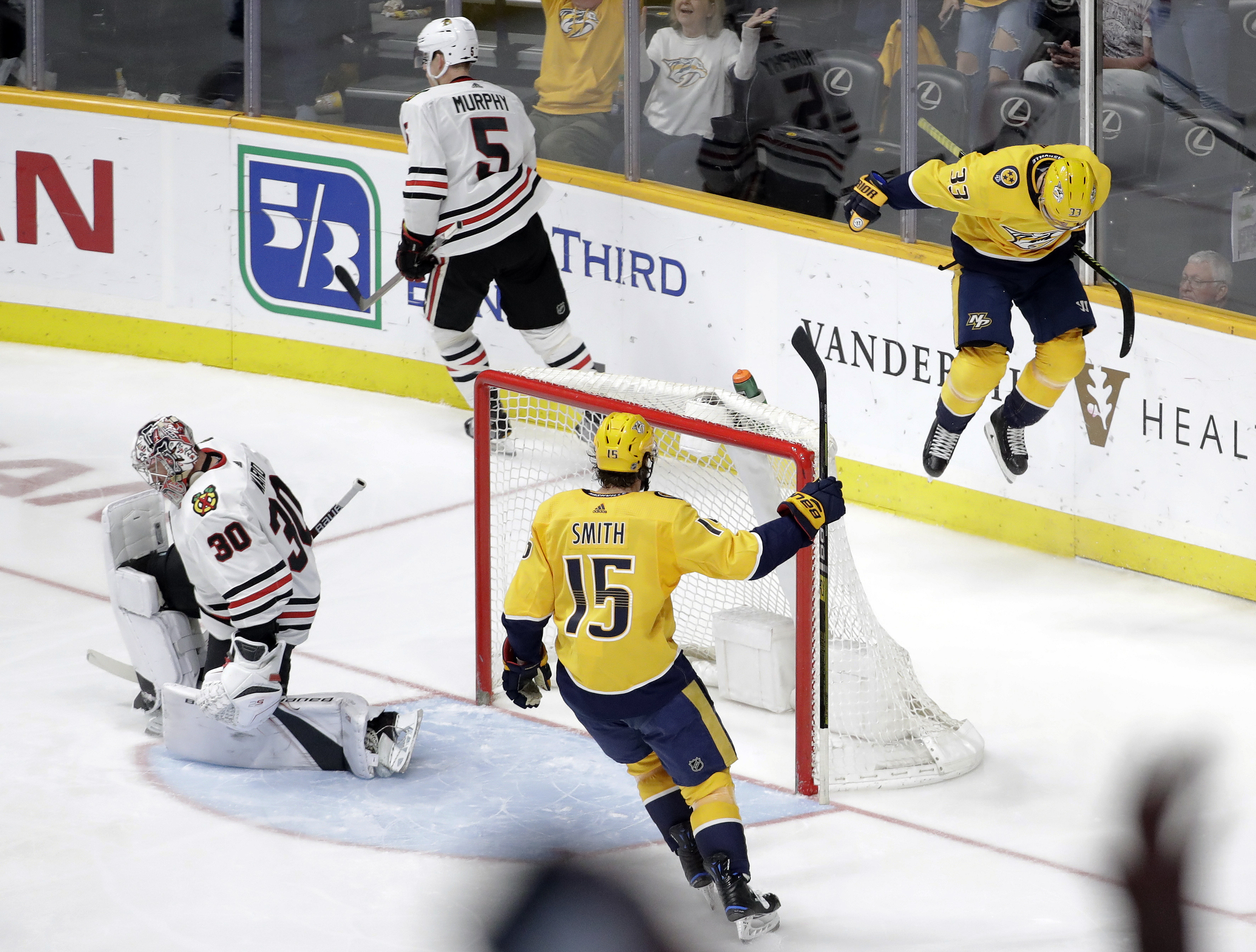 Predators rally again, clinch Central beating Blackhawks 5-2