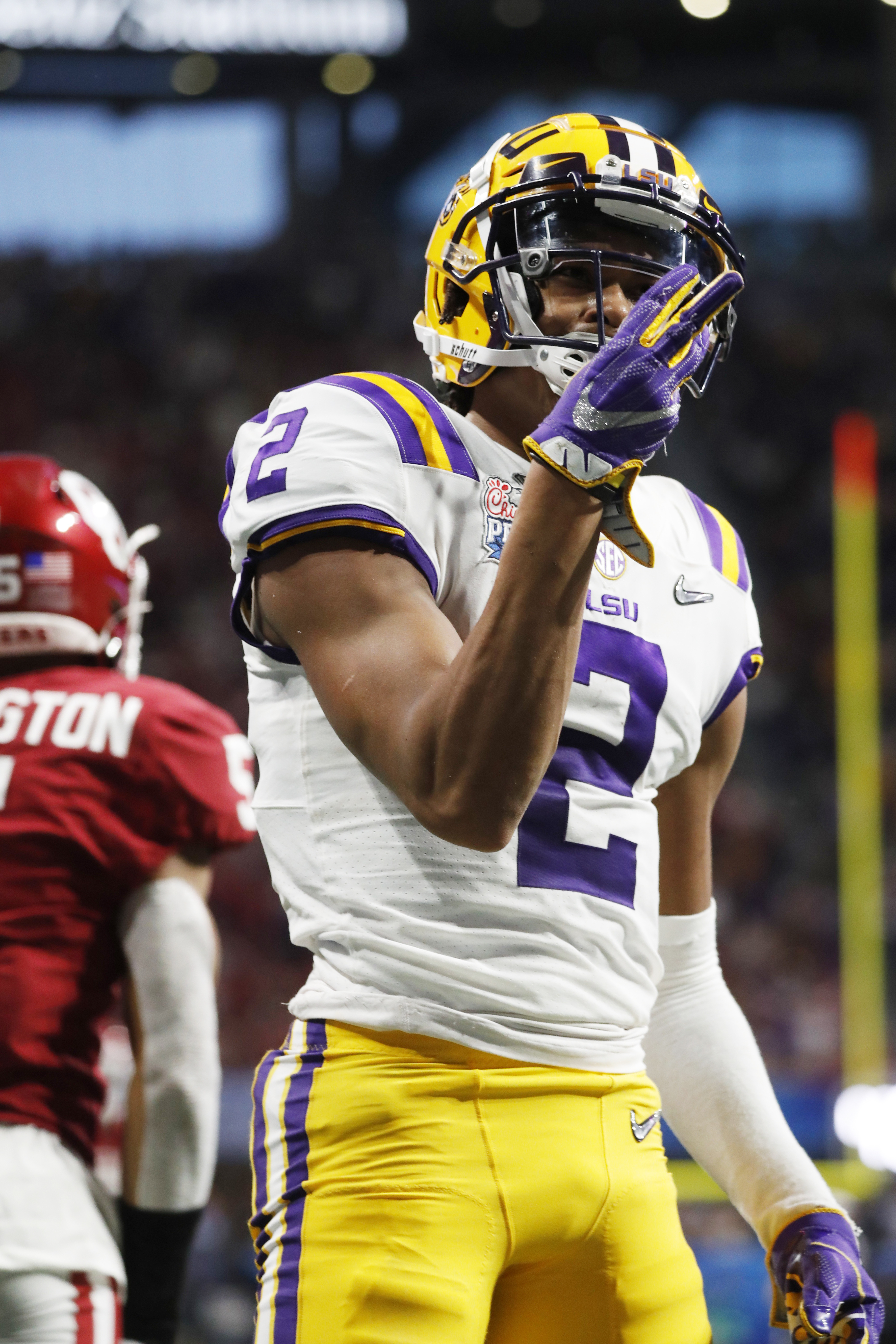 No. 1 LSU's Burrow's 7 TD passes ties record for bowl game