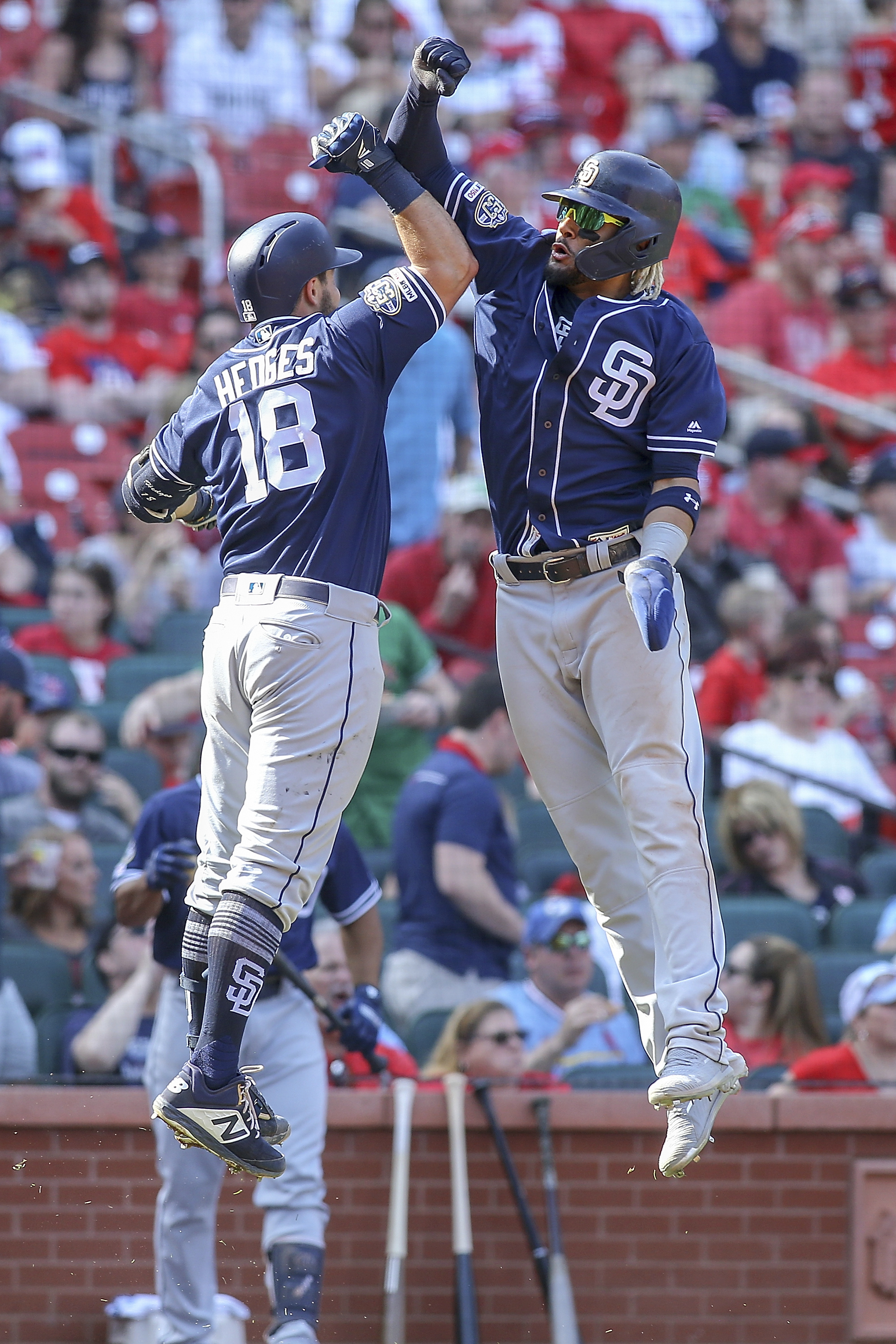 Padres rally for 6-4 win against Miller, Cardinals