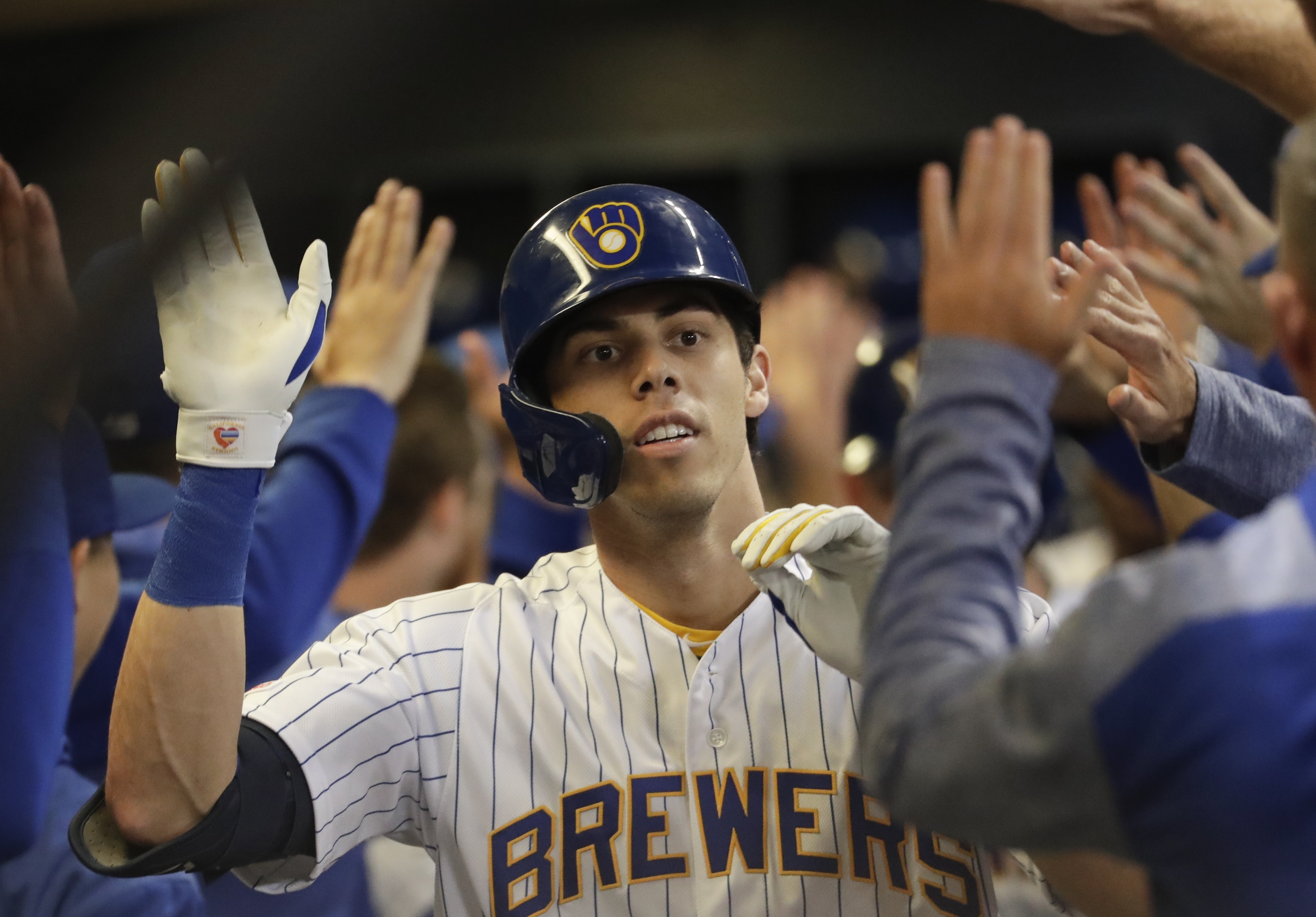 Yelich, Davies pace Brewers past Cubs, 7-1