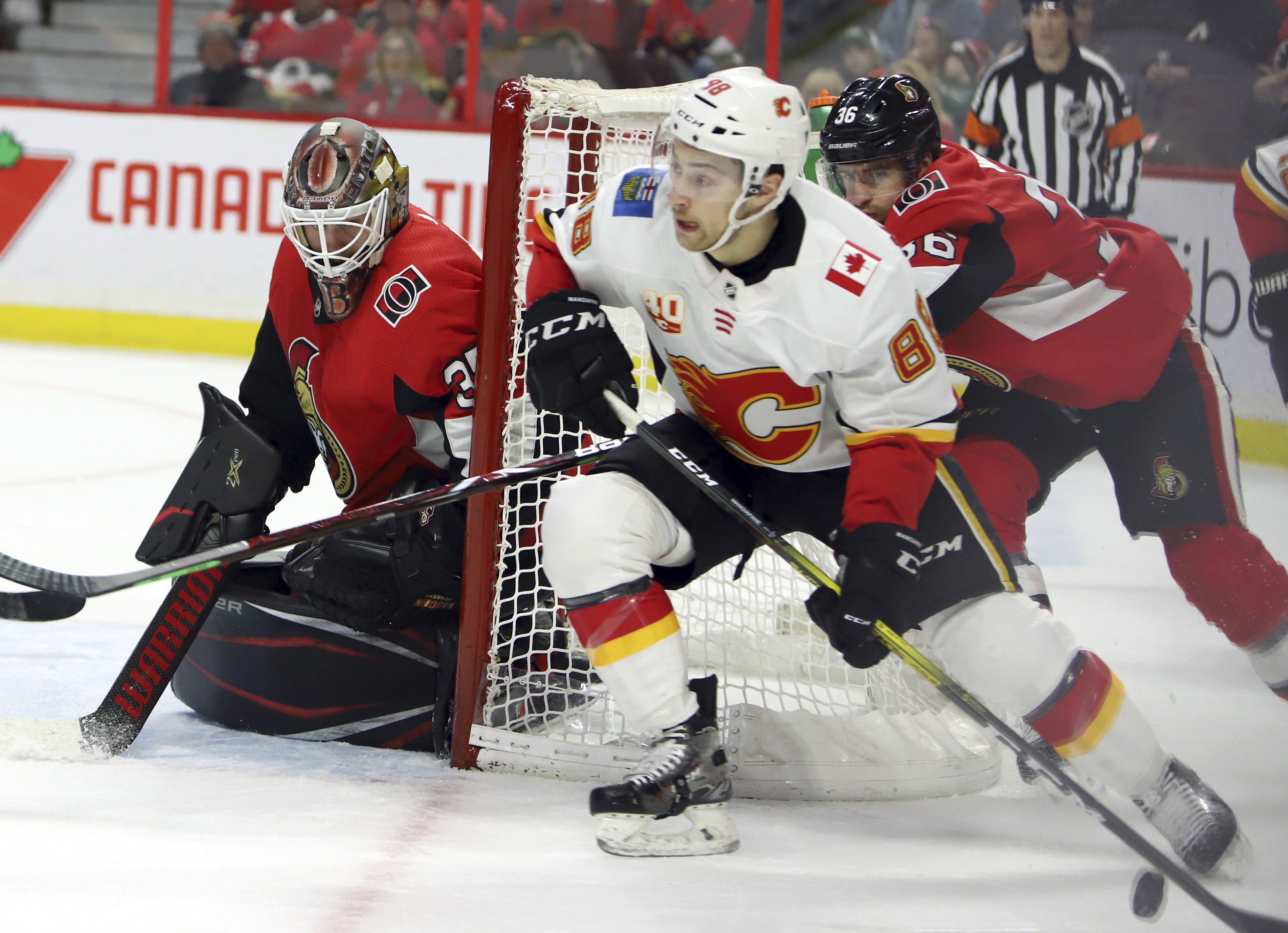 Hogberg makes 40 saves, Senators beat Flames 5-2