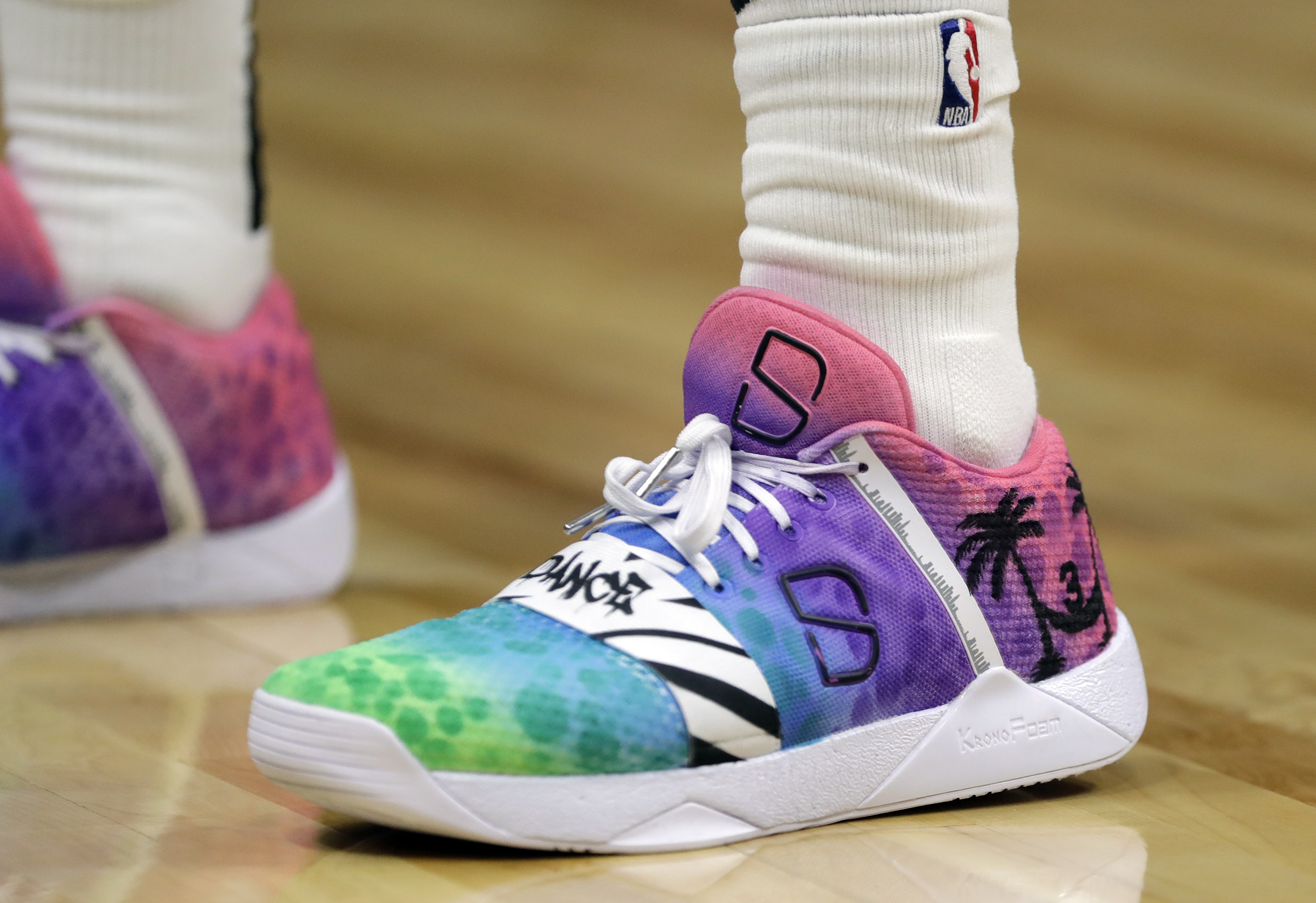 Kick game: Nets' Dinwiddie plays with artwork on his feet