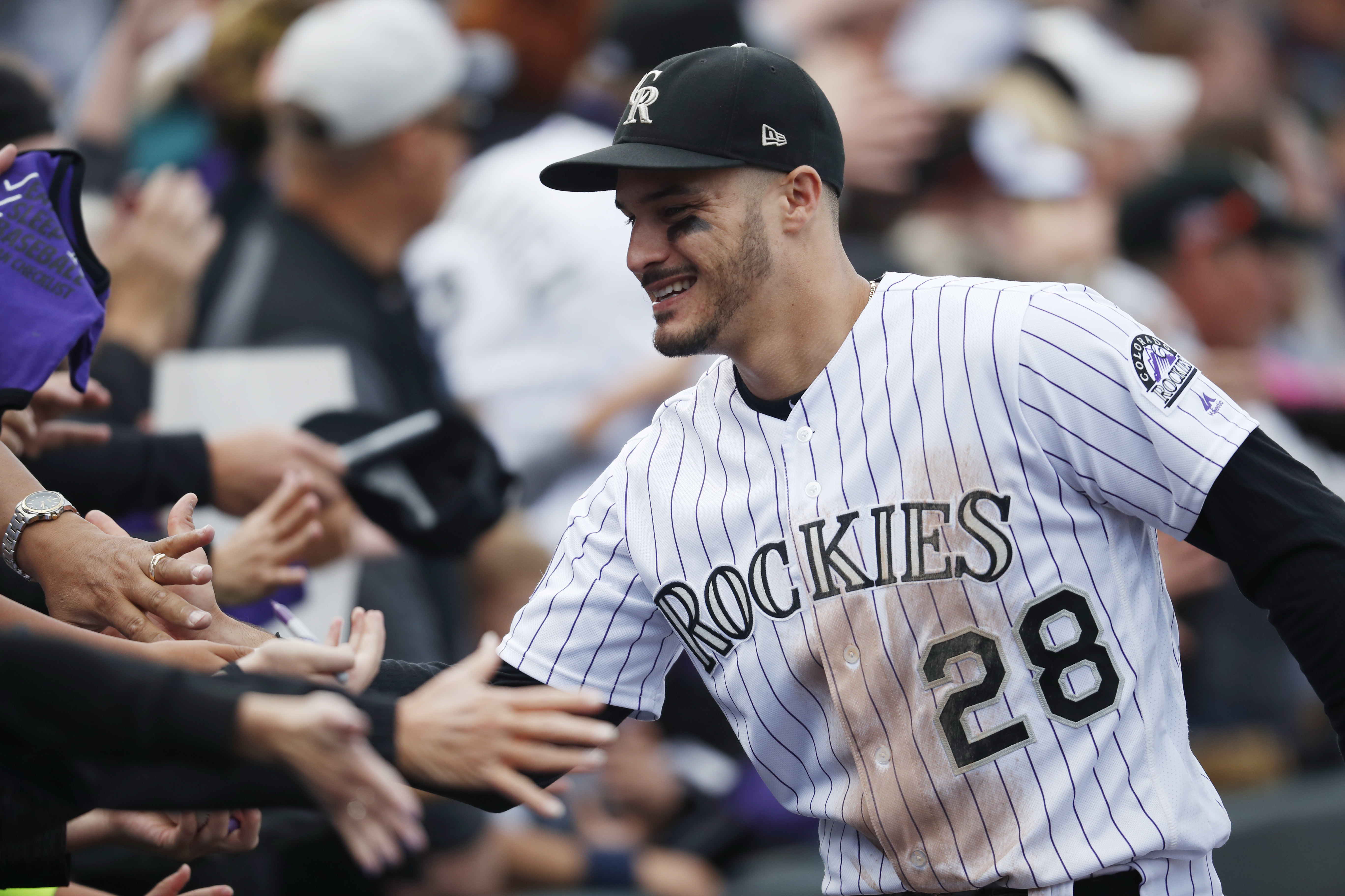 AP source: Rockies, Arenado agree to $260M, 8-year contract