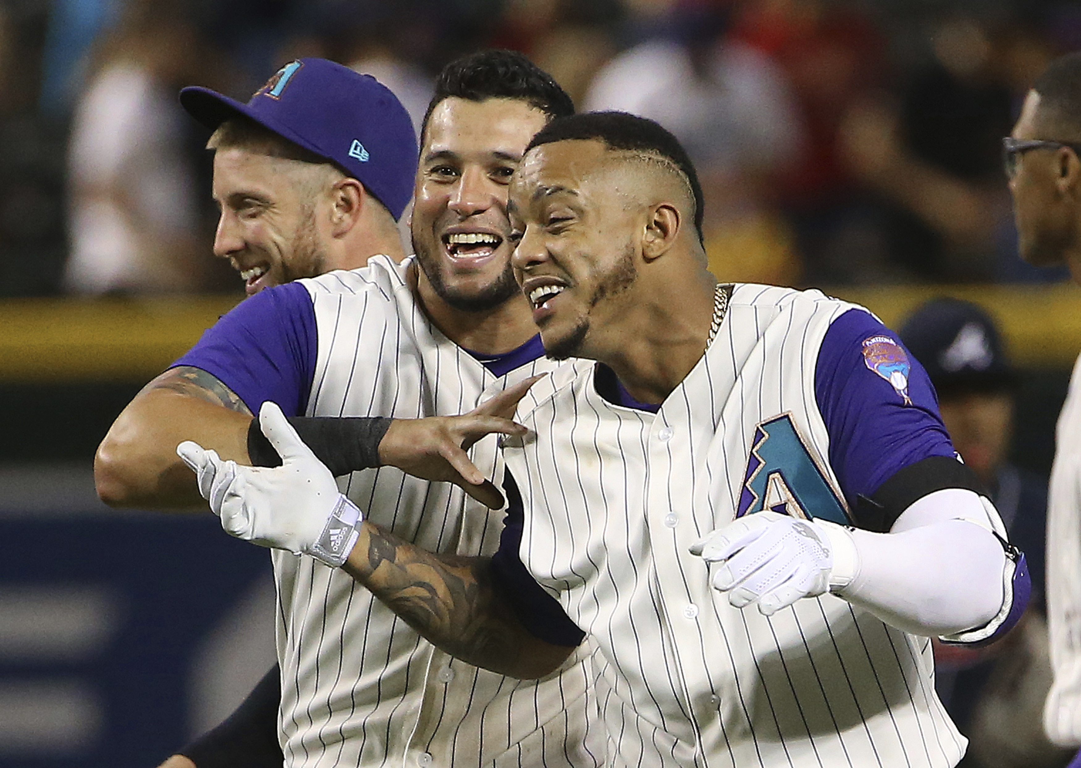 Peralta, Marte lift Diamondbacks over Braves 3-2 in 10