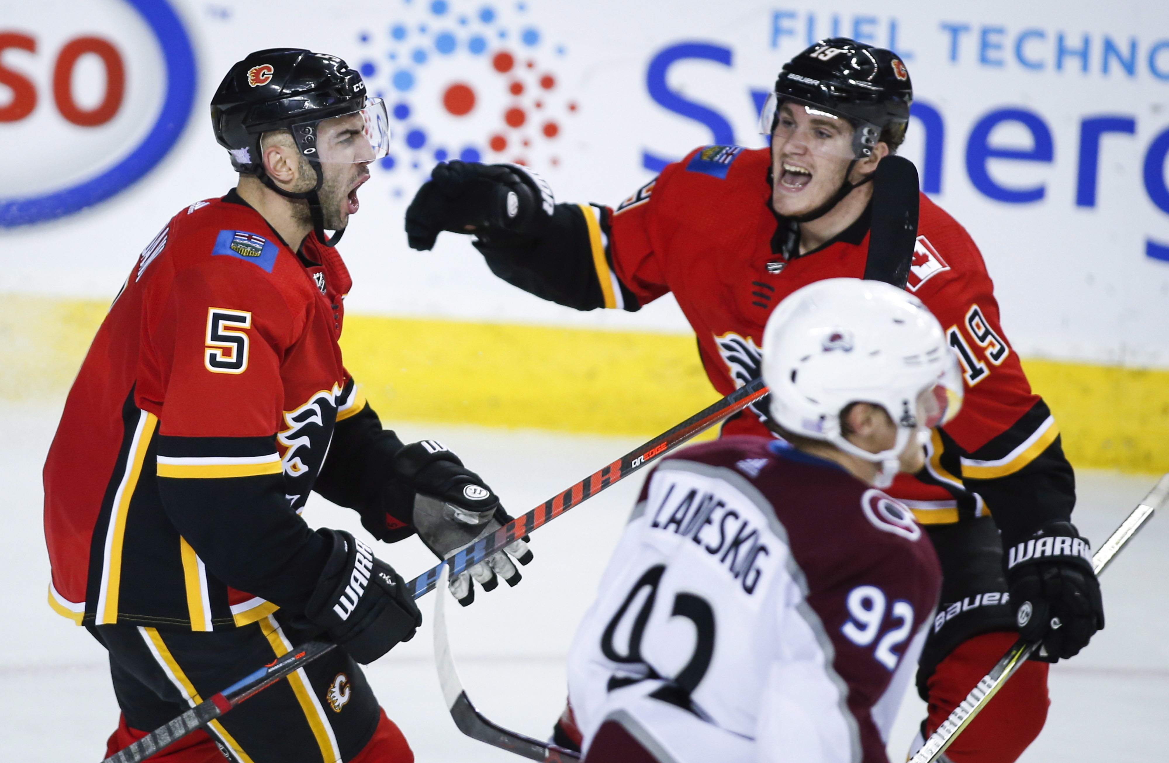 Flames score 5 straight in 3rd to rally past Avalanche 6-5