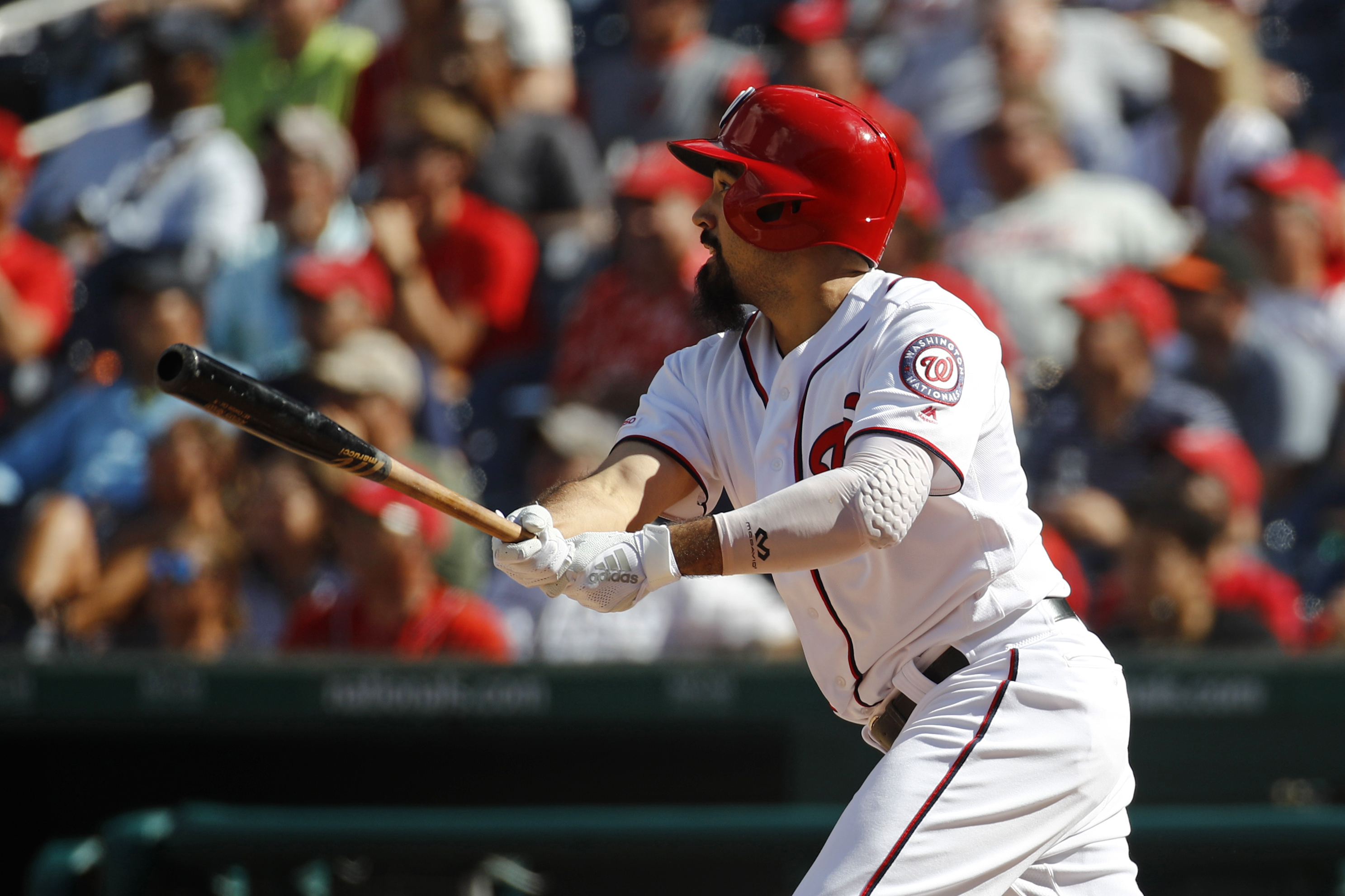 Turner's slam helps Nats sweep Phils, clinch wild card