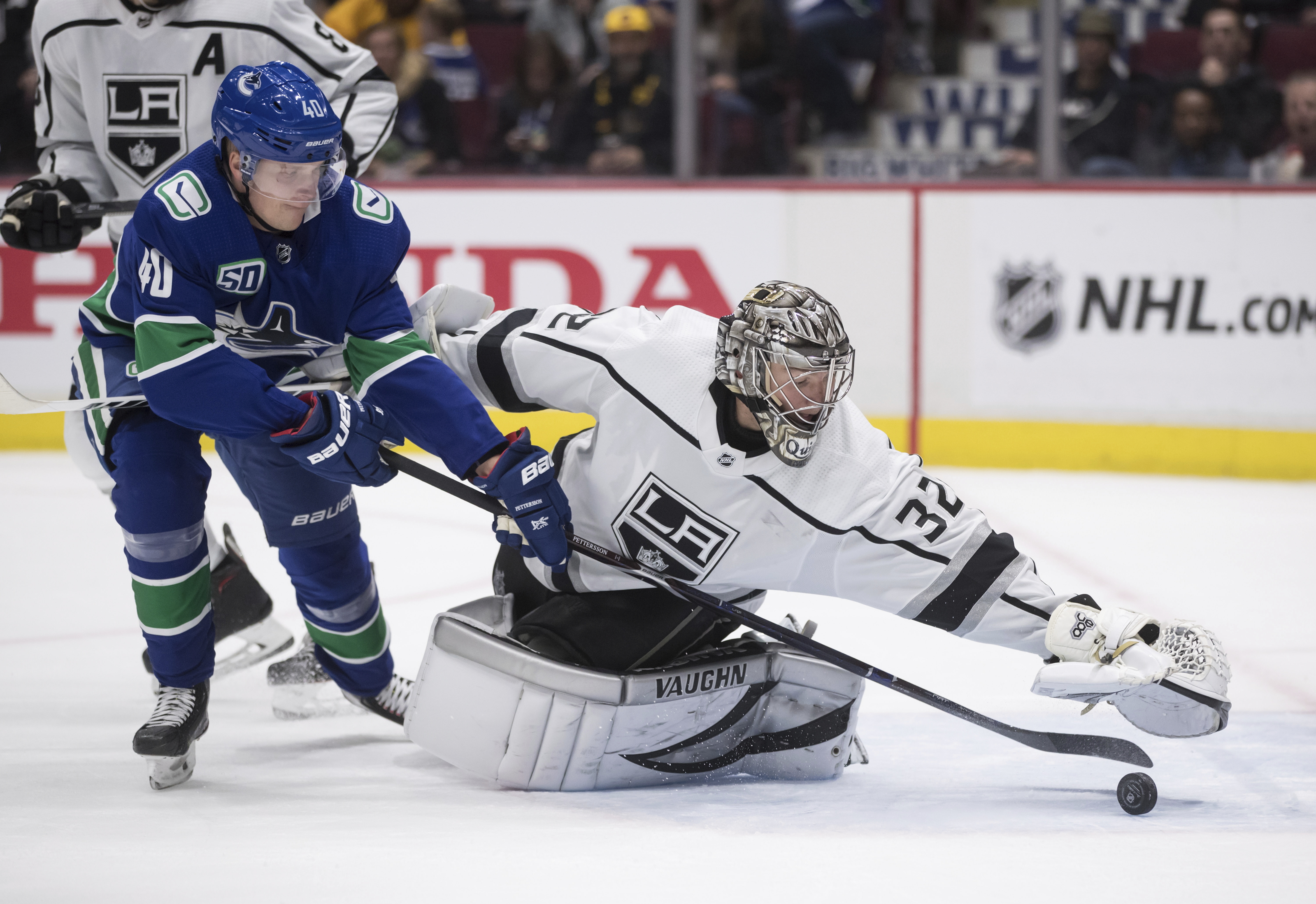 Miller finishes with 4 points, Canucks beat Kings 8-2