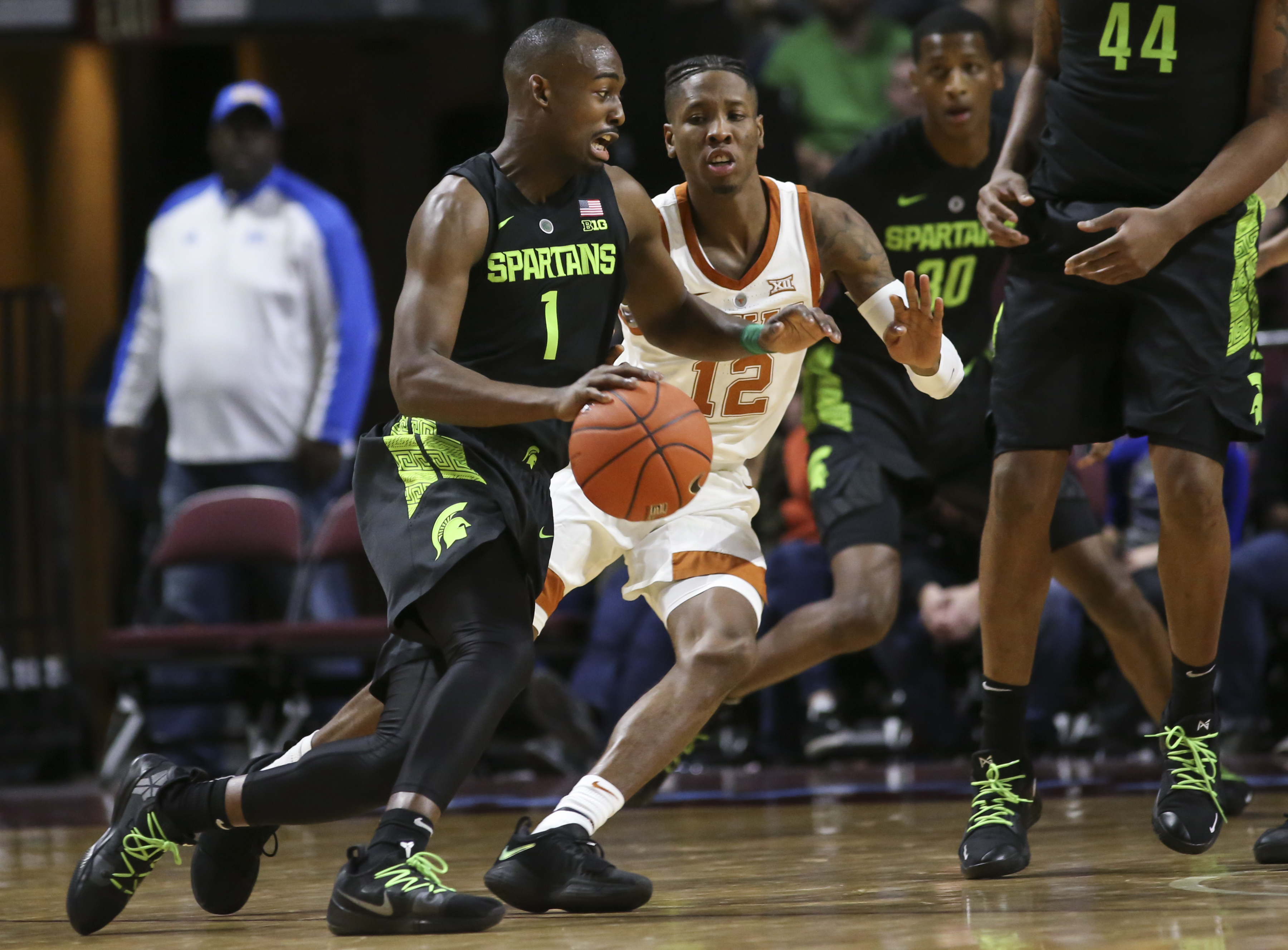 The Latest: No. 11 Michigan State tops Texas for Vegas title