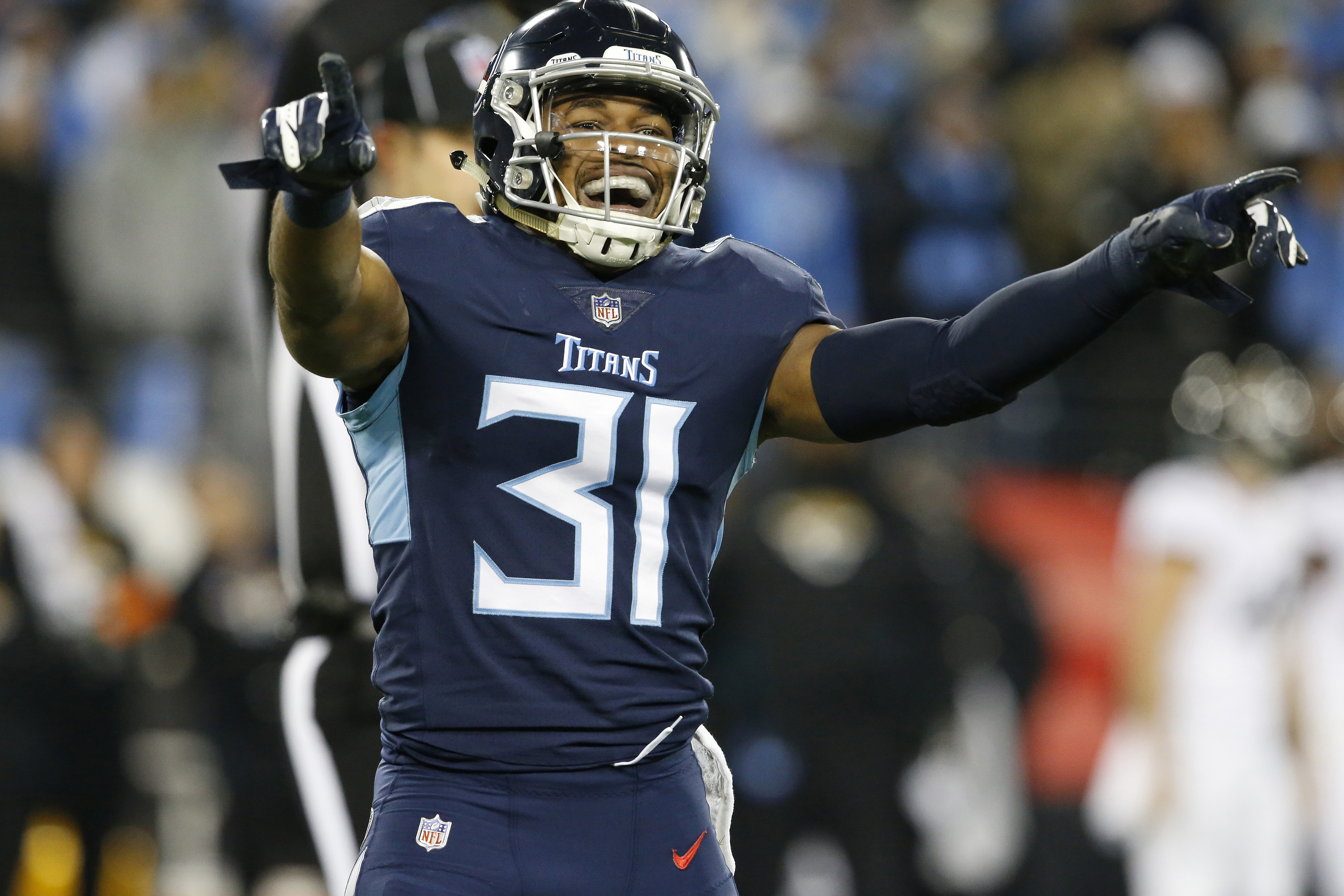 Derrick Henry runs into NFL record book as Titans rout Jaguars 30-9