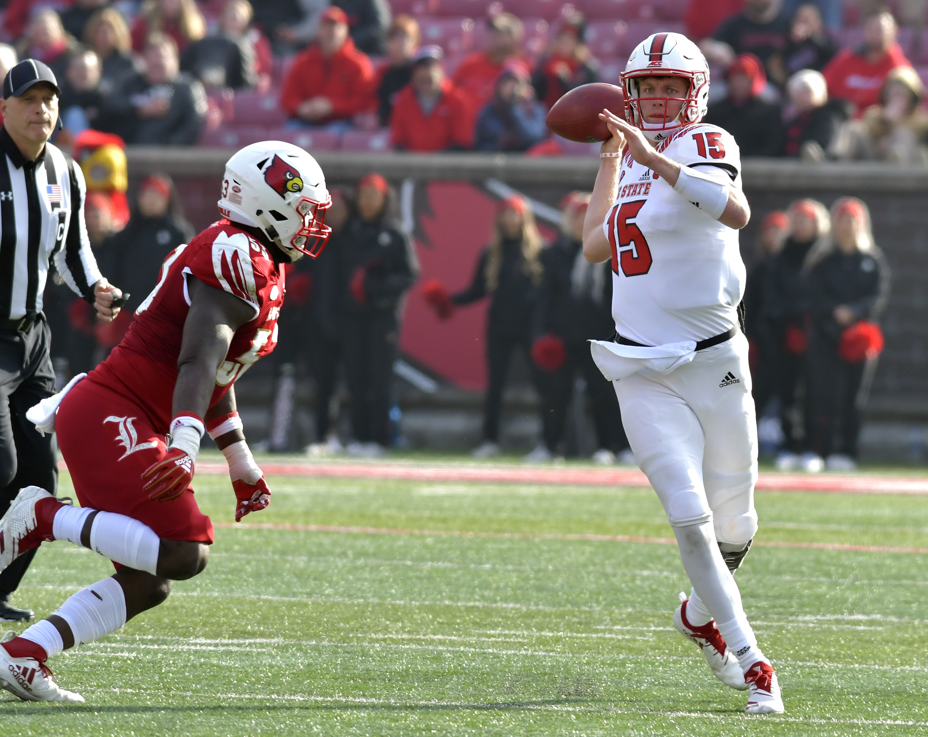 Finley, Wolfpack roll over Louisville 52-10