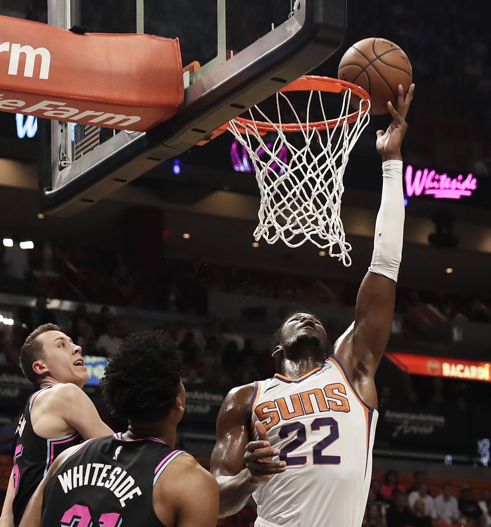 Suns snap team-record 17-game skid, beat Heat 124-121