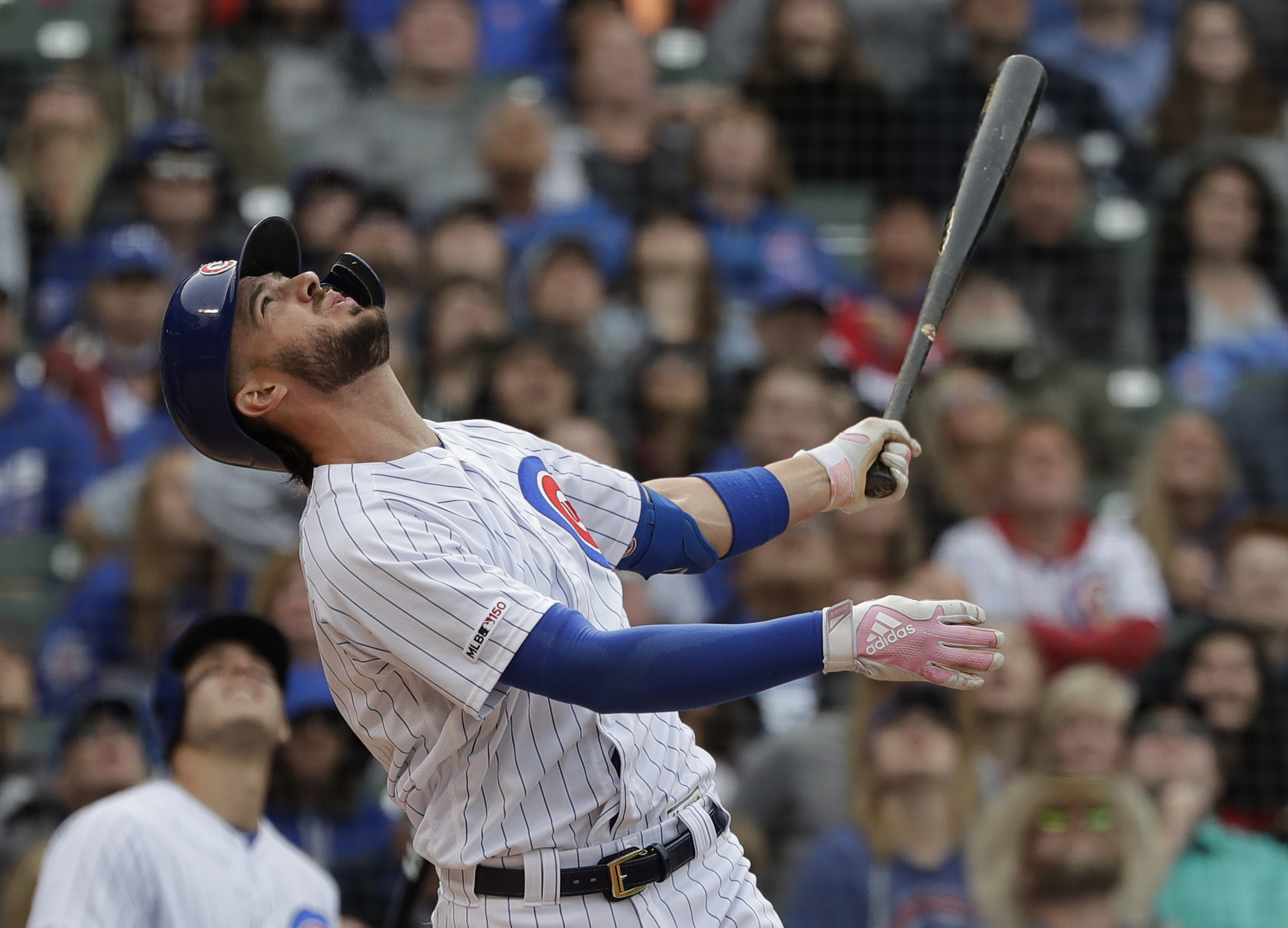 Cubs slugger Kris Bryant exits game after outfield collision