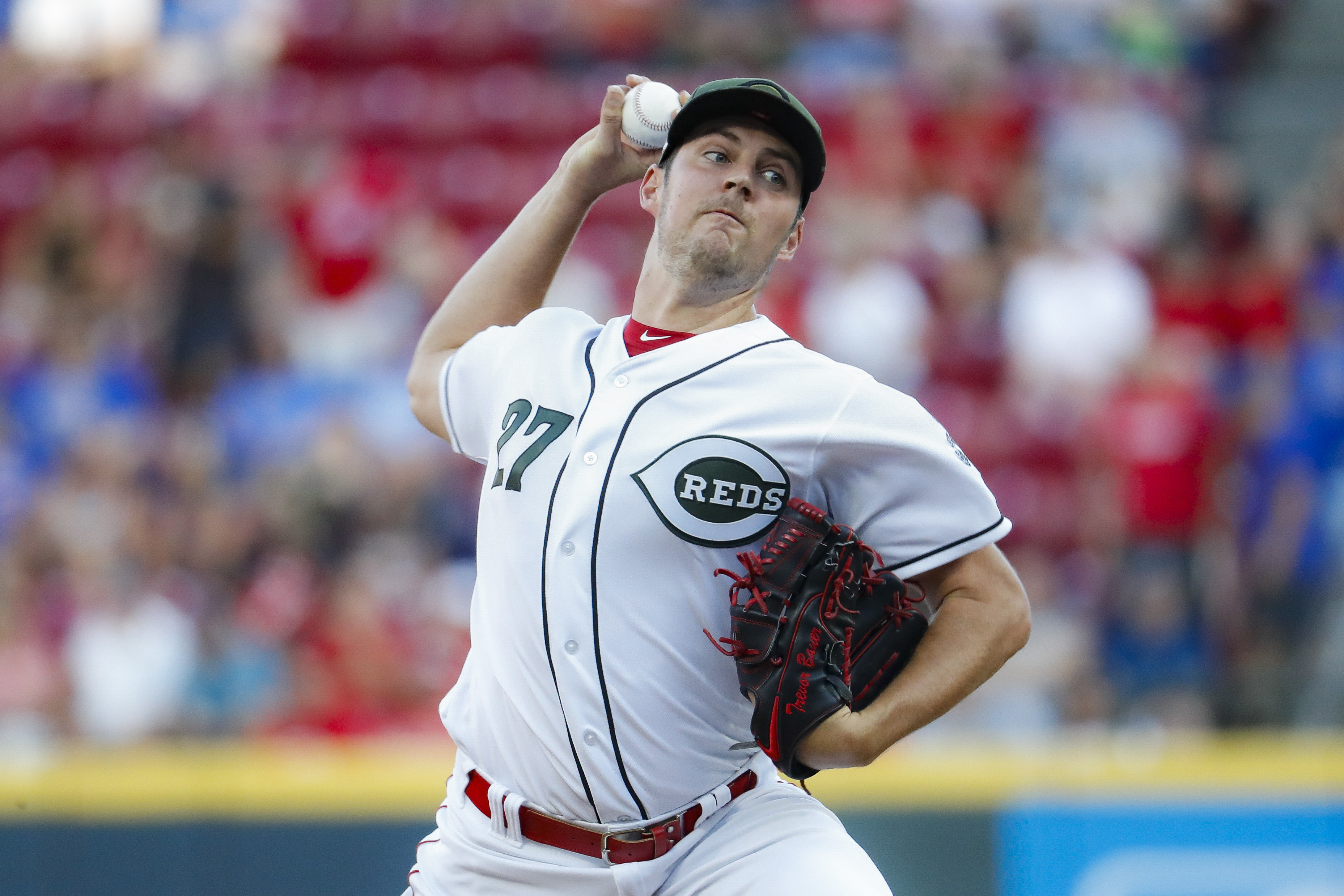 Trevor Bauer fans 11 in Reds home debut, beats Cubs 5-2