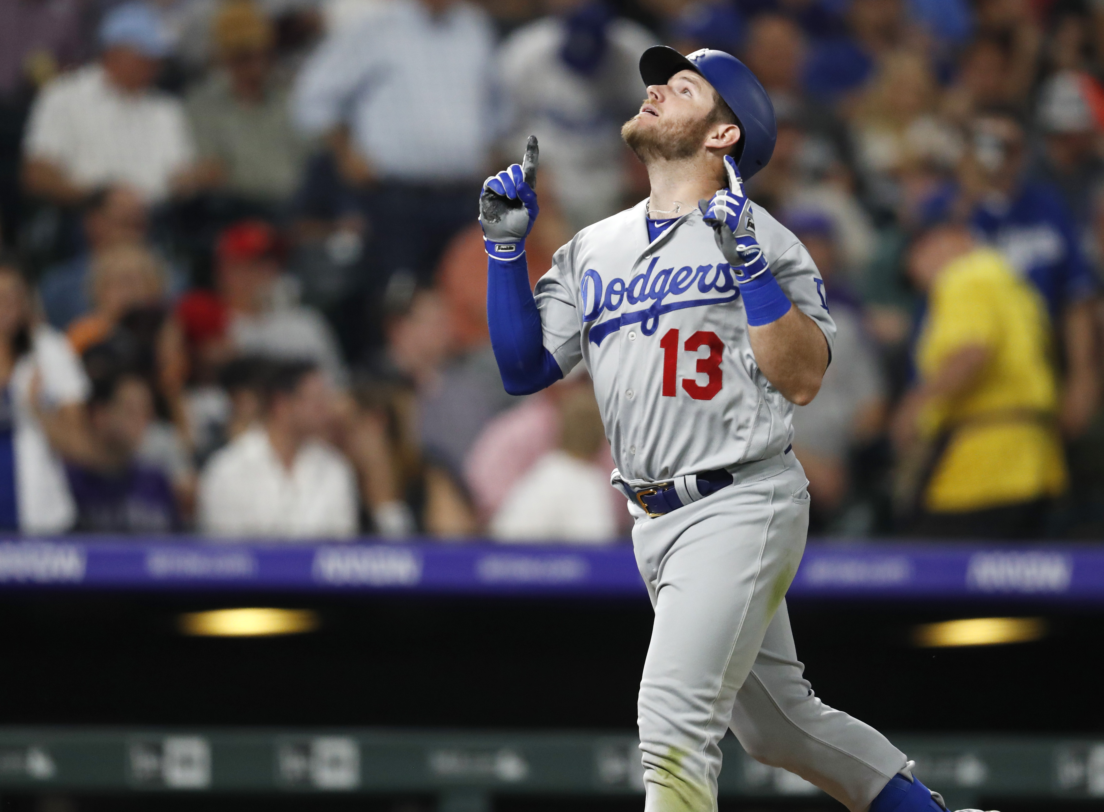 Taylor, Muncy help Dodgers stage another late win over Rox