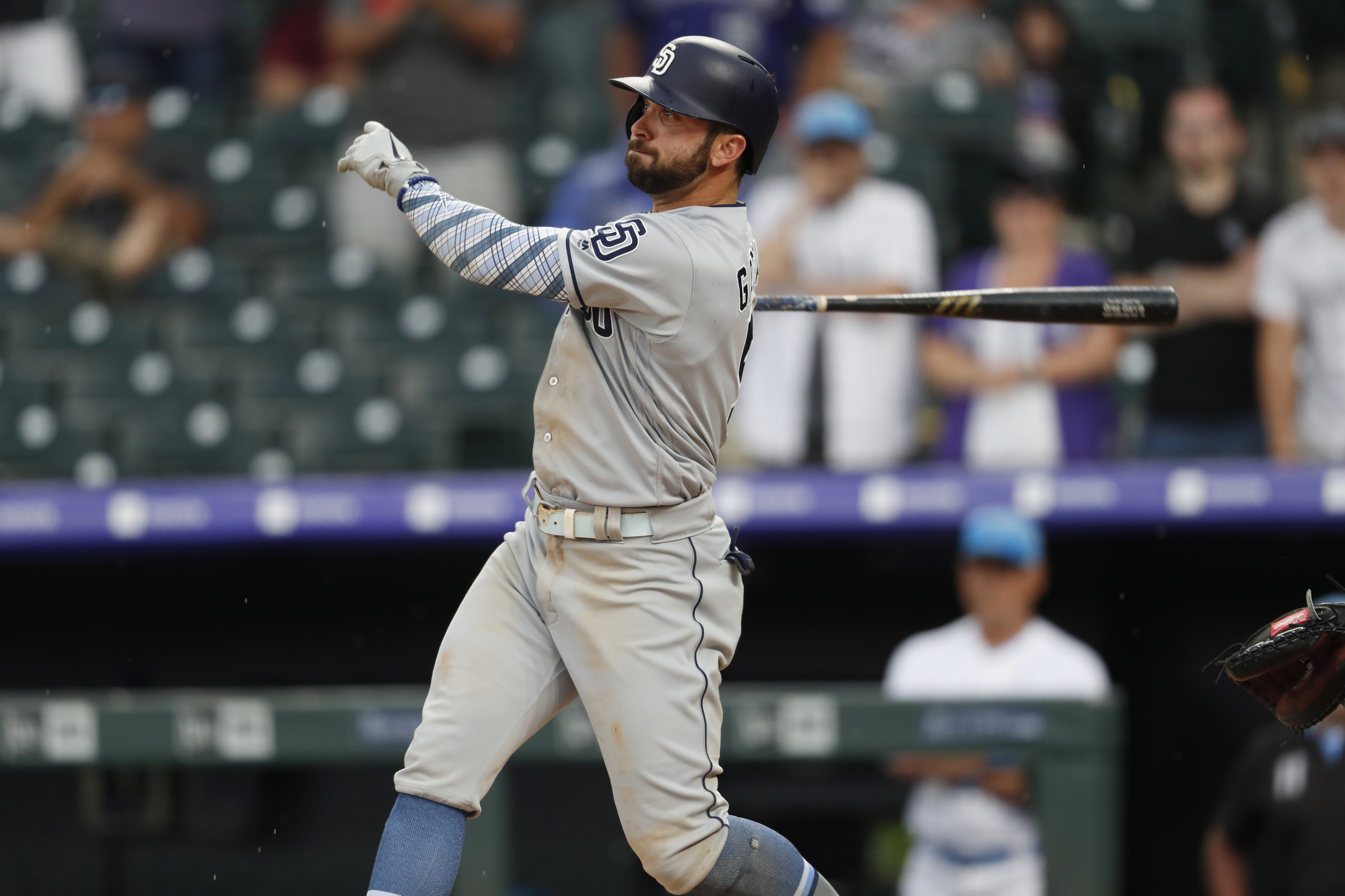 Padres edge Rockies in another slugfest at Coors Field