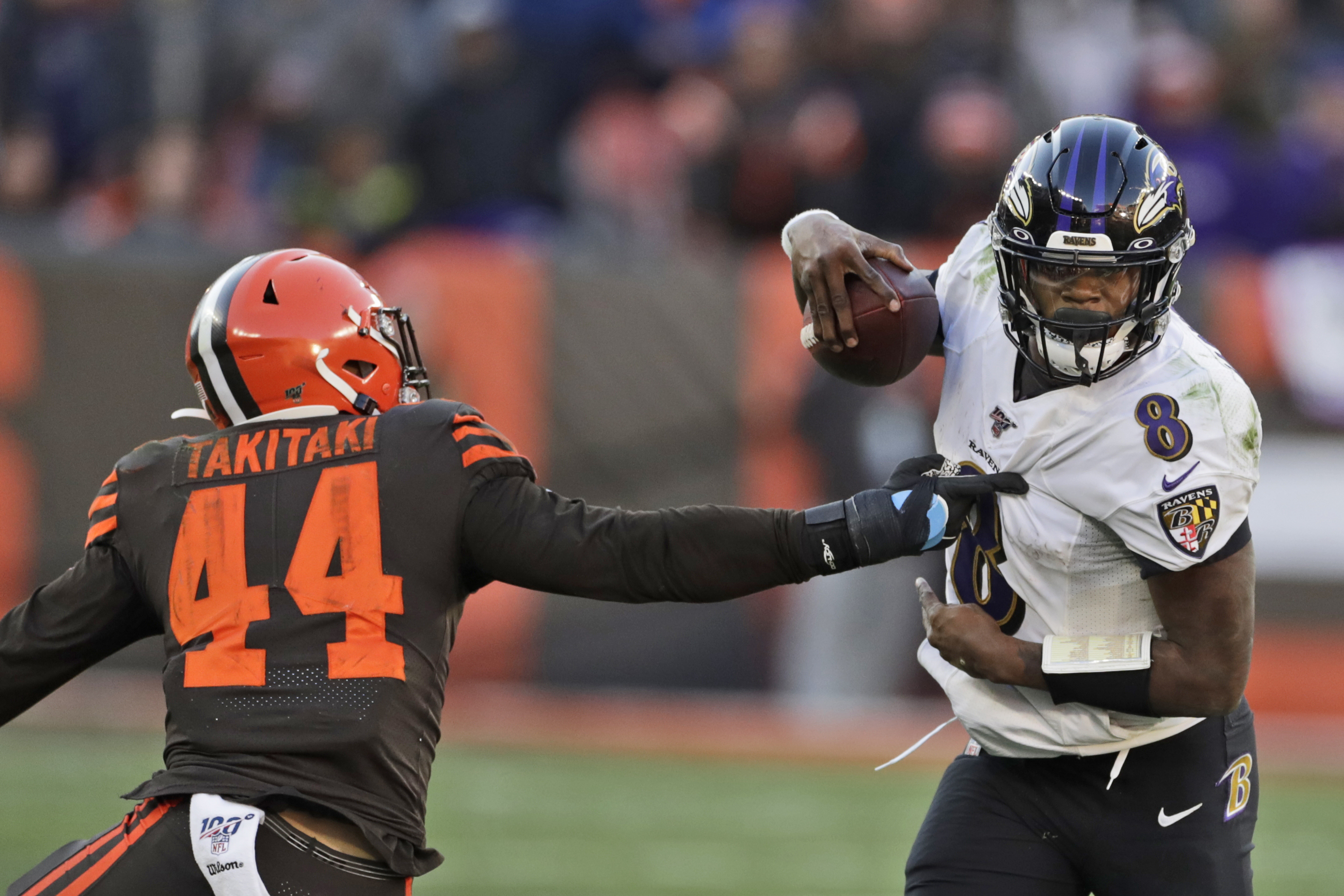 Ravens clinch AFC's top seed by beating Browns 31-15