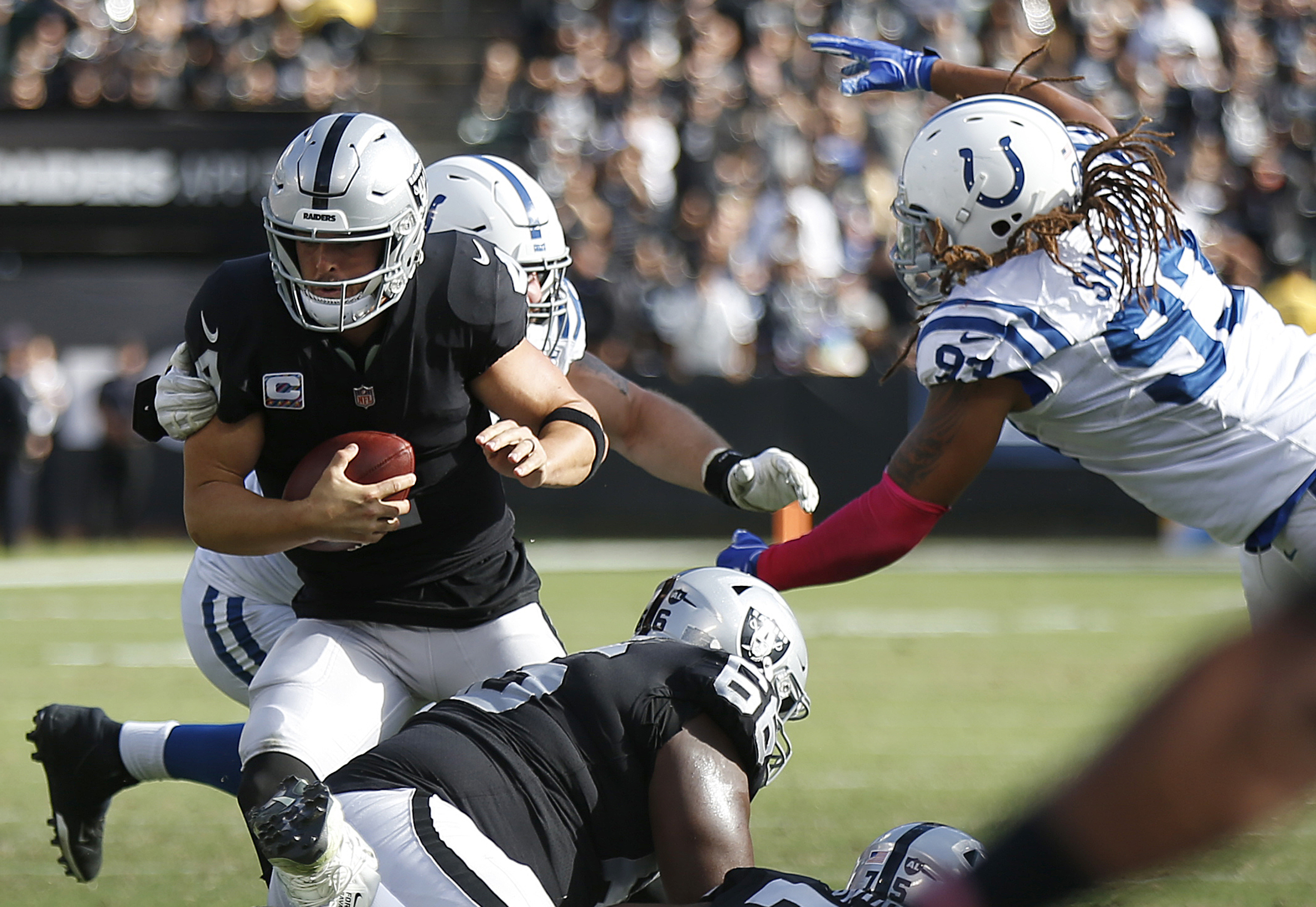 Carr's rough week ends in Raiders 42-28 loss to Colts