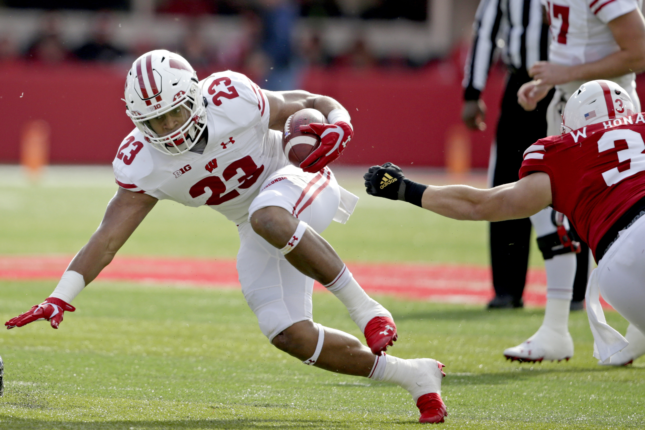 No. 14 Wisconsin seeks 14th straight victory over Purdue