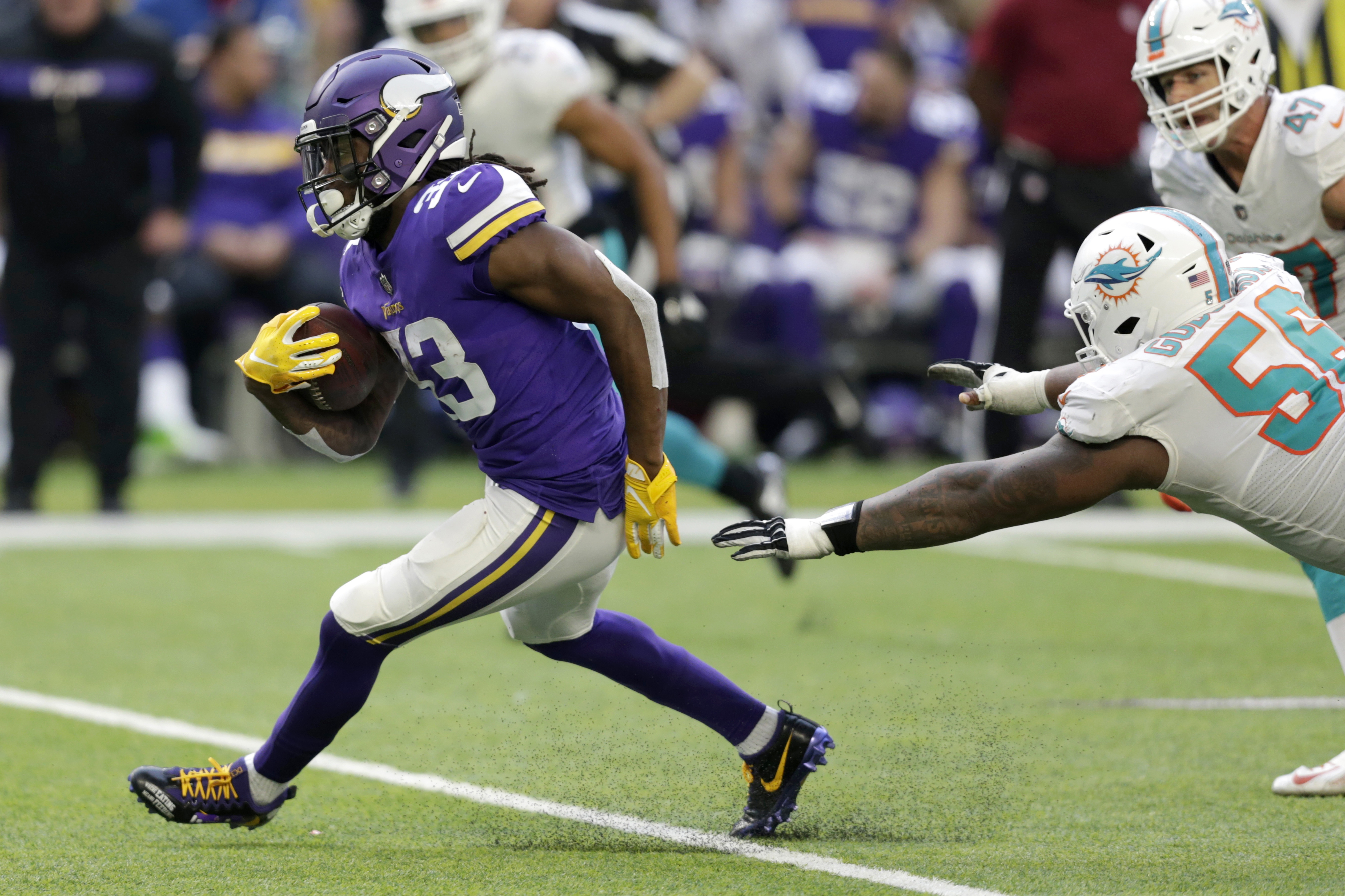 Cook carries Vikings past Dolphins 41-17