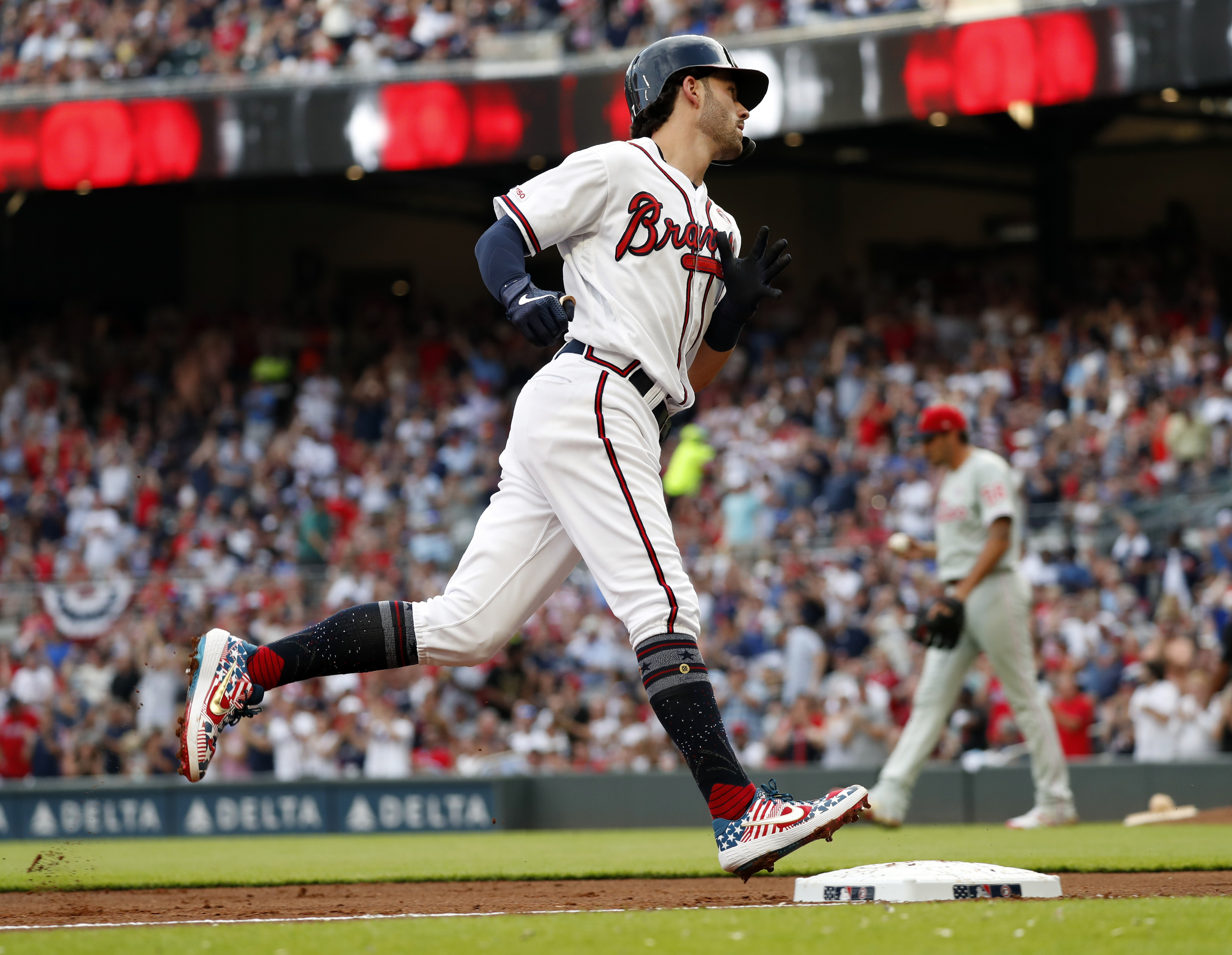 Swanson, Albies helps Braves rally to beat Phillies 12-6