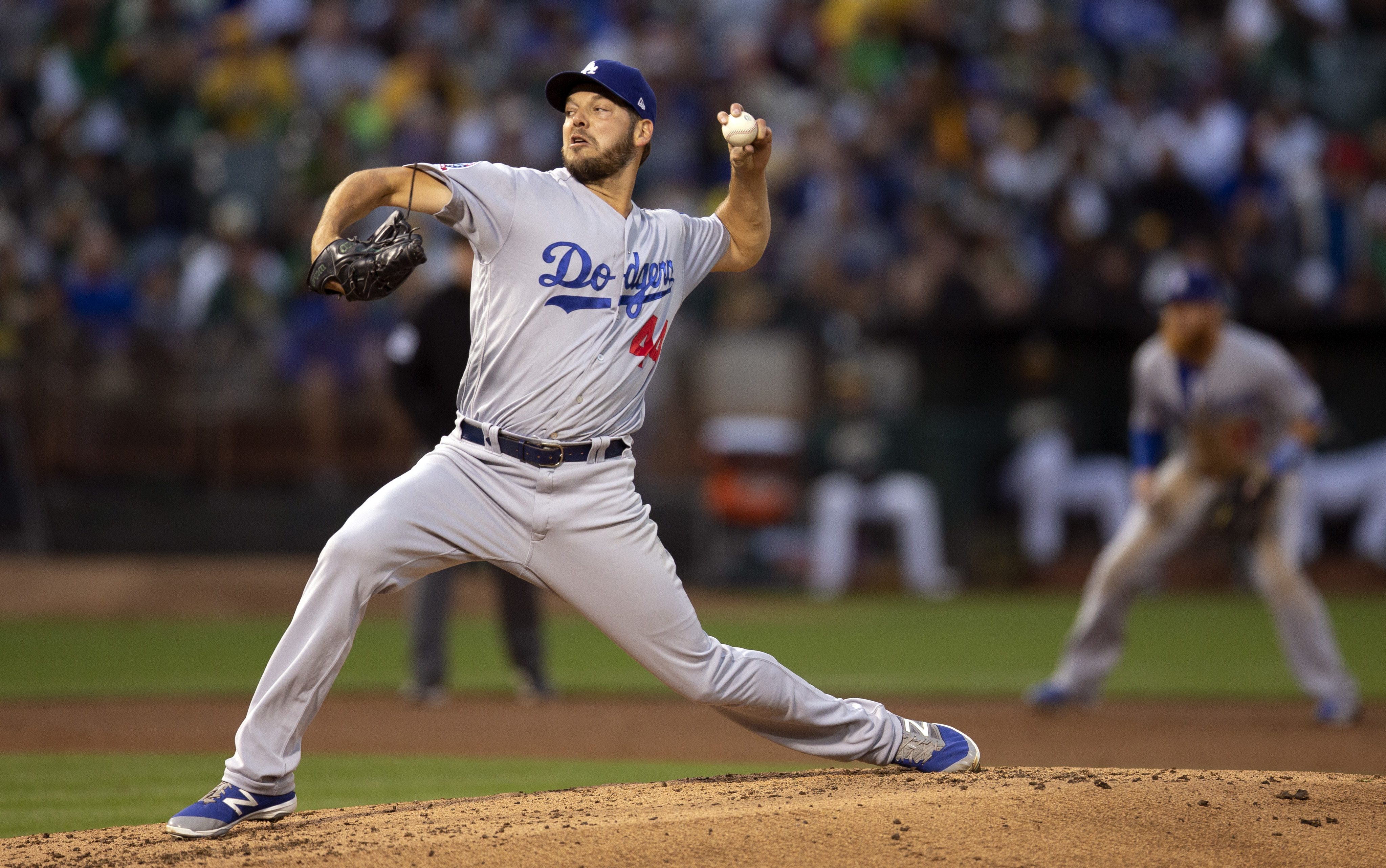 Rich Hill pitches Dodgers past his former A’s club 4-2